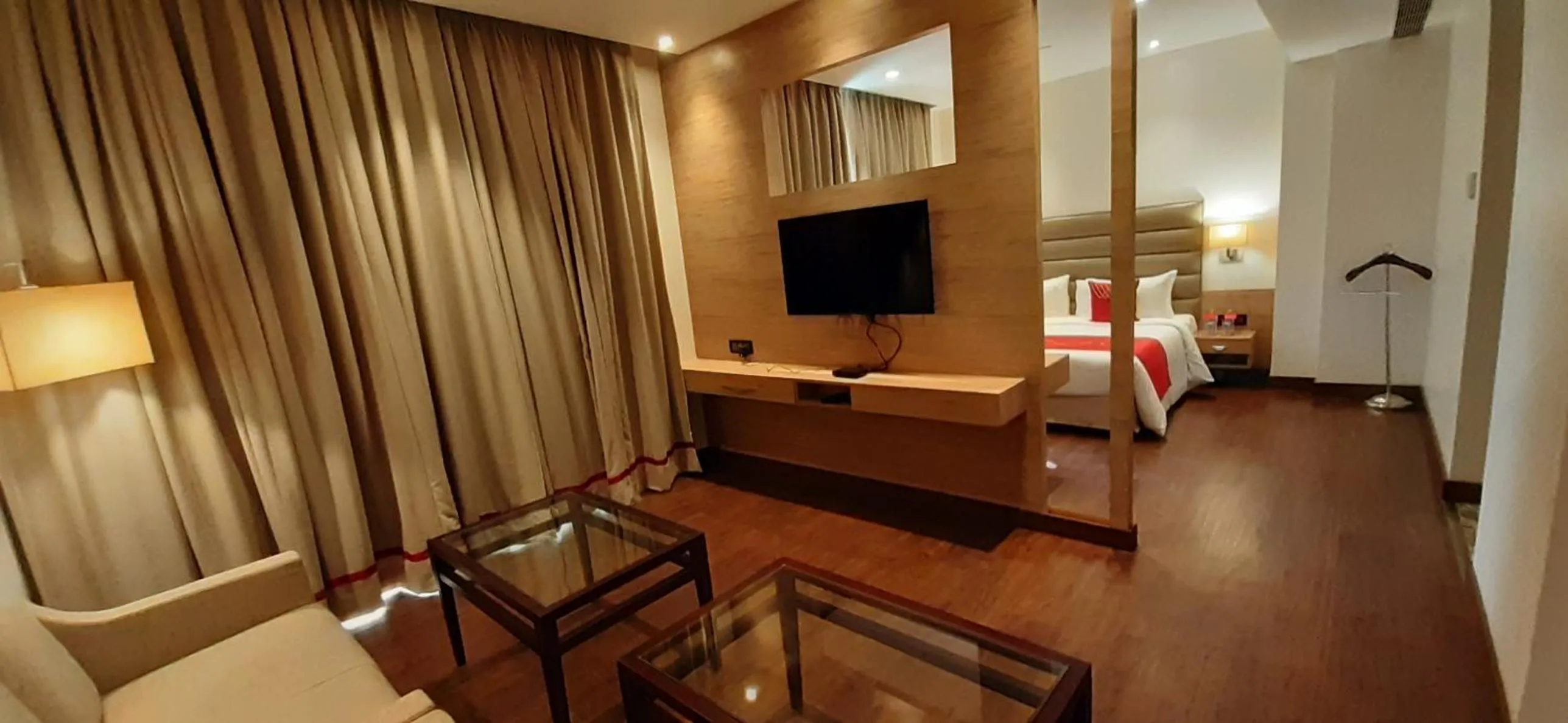 Living room, Bed in Ramada by Wyndham Aligarh GT Road