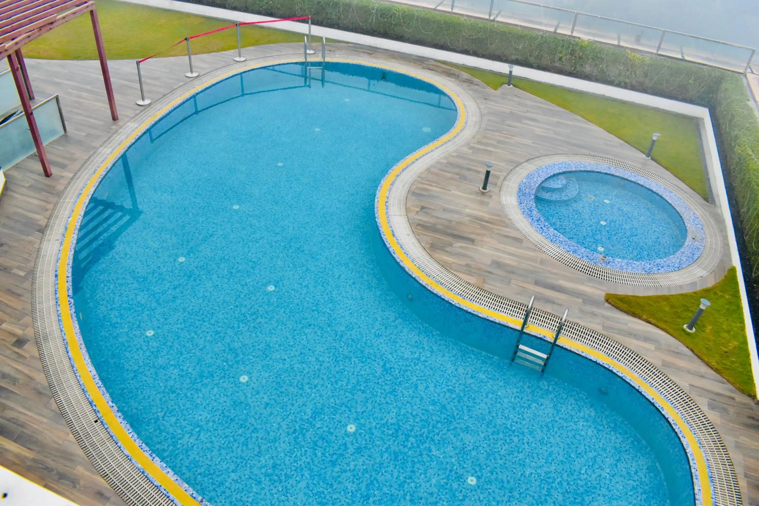 Swimming pool in Ramada by Wyndham Aligarh GT Road