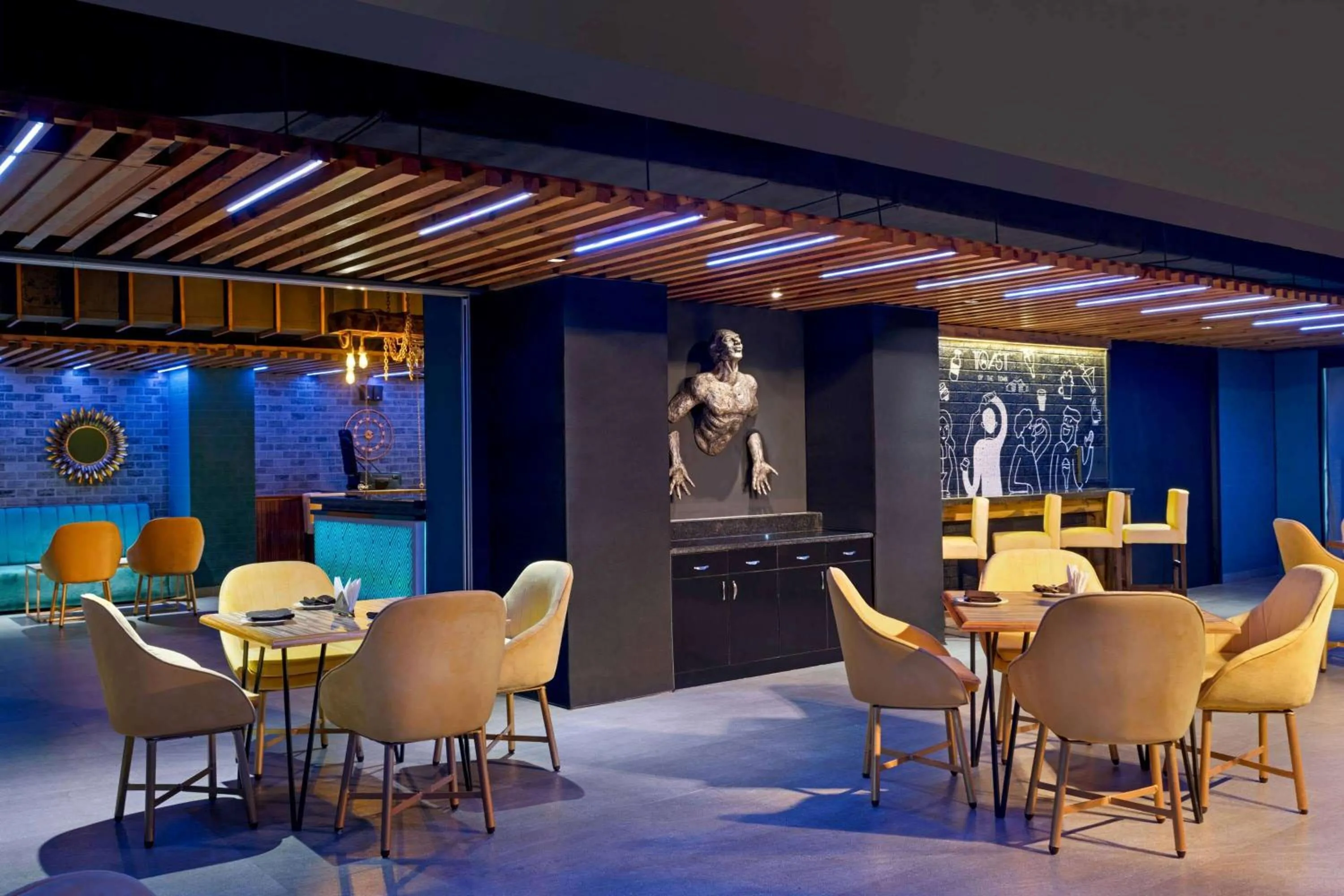 Lounge or bar in Ramada by Wyndham Aligarh GT Road