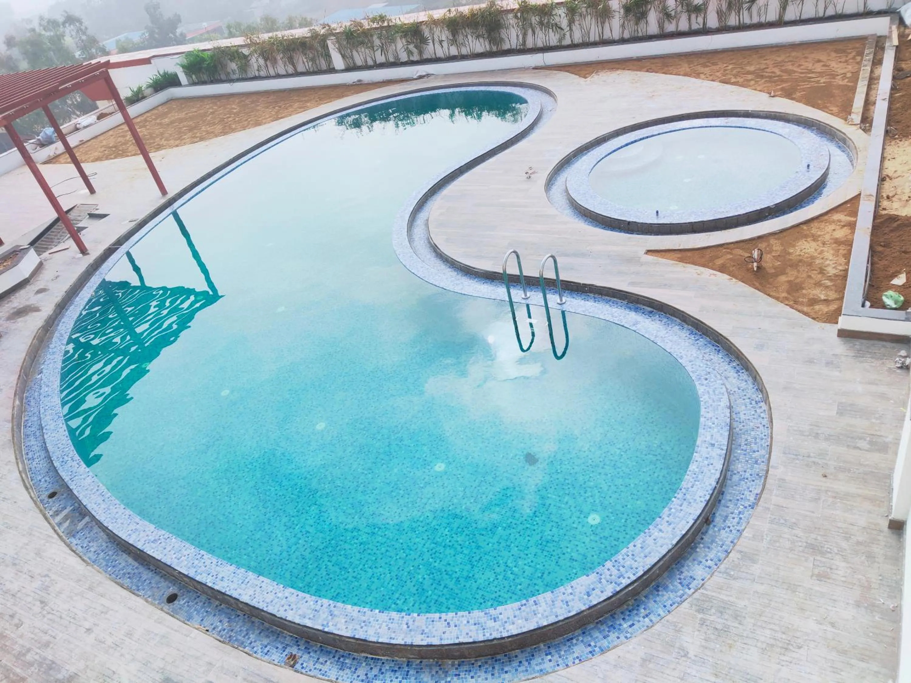 Swimming pool in Ramada by Wyndham Aligarh GT Road