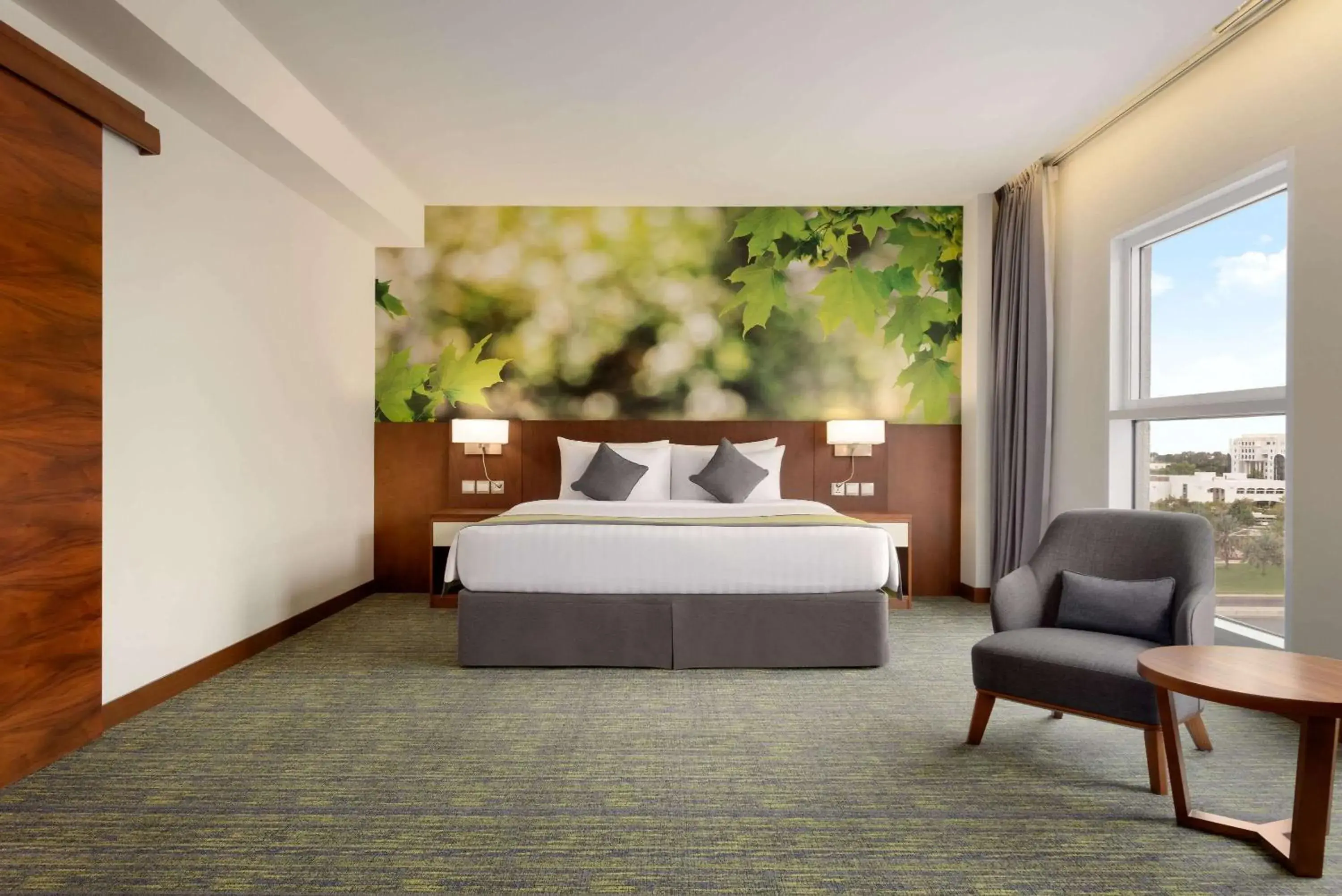 Photo of the whole room, Bed in Wyndham Garden Muscat Al Khuwair Photo of the whole room, Bed in Wyndham Garden Muscat Al Khuwair