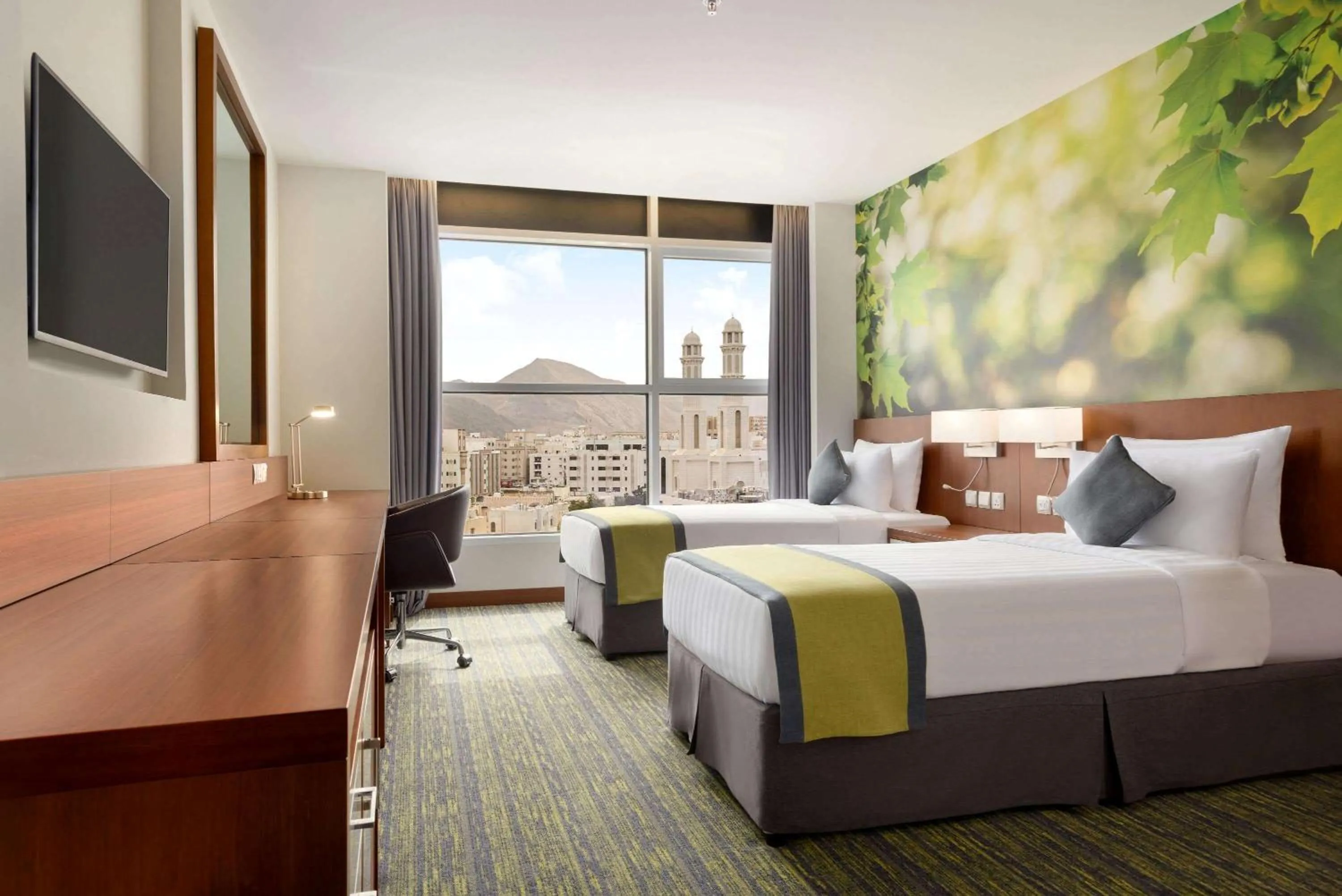 Photo of the whole room, Bed in Wyndham Garden Muscat Al Khuwair