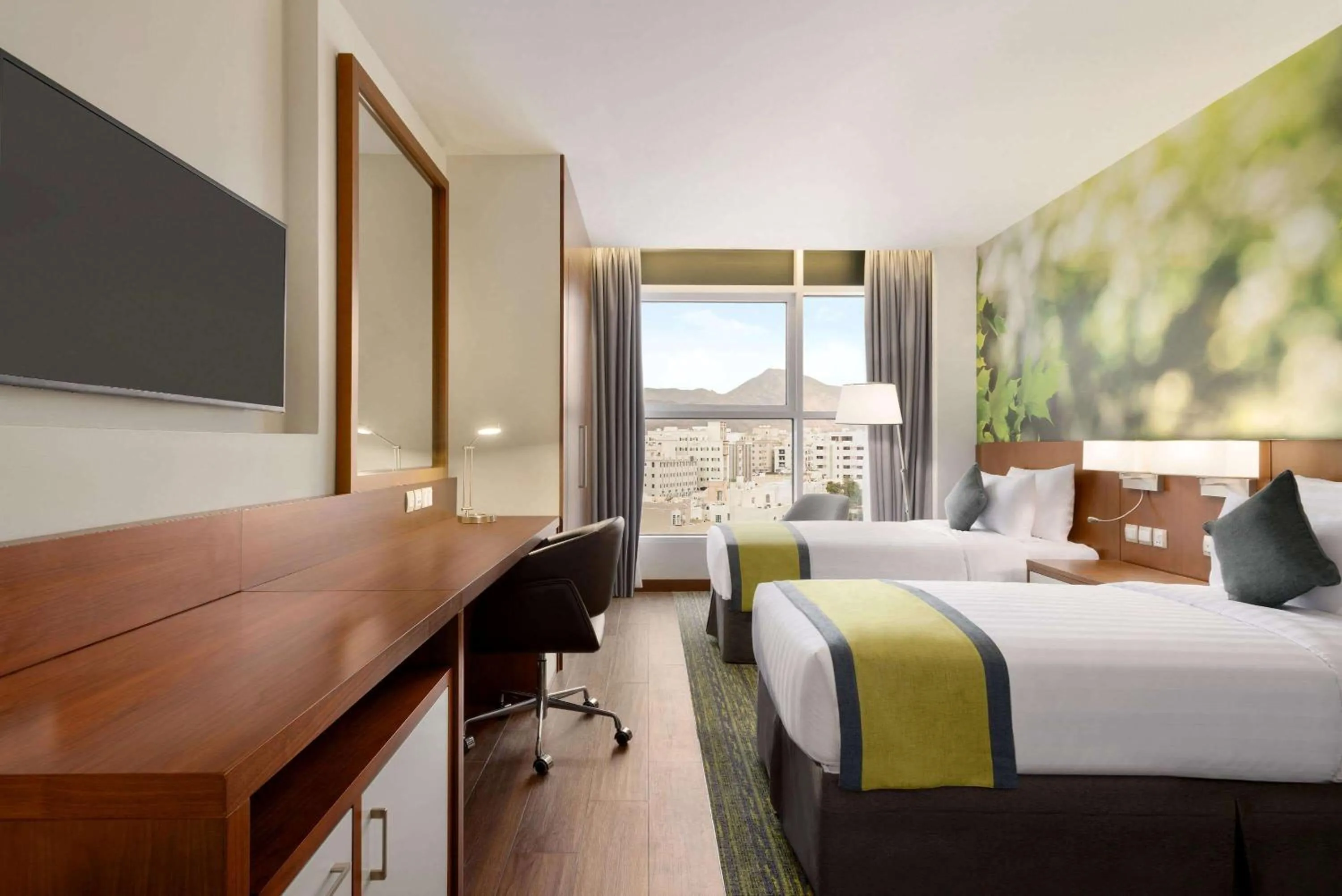 Photo of the whole room, Bed in Wyndham Garden Muscat Al Khuwair