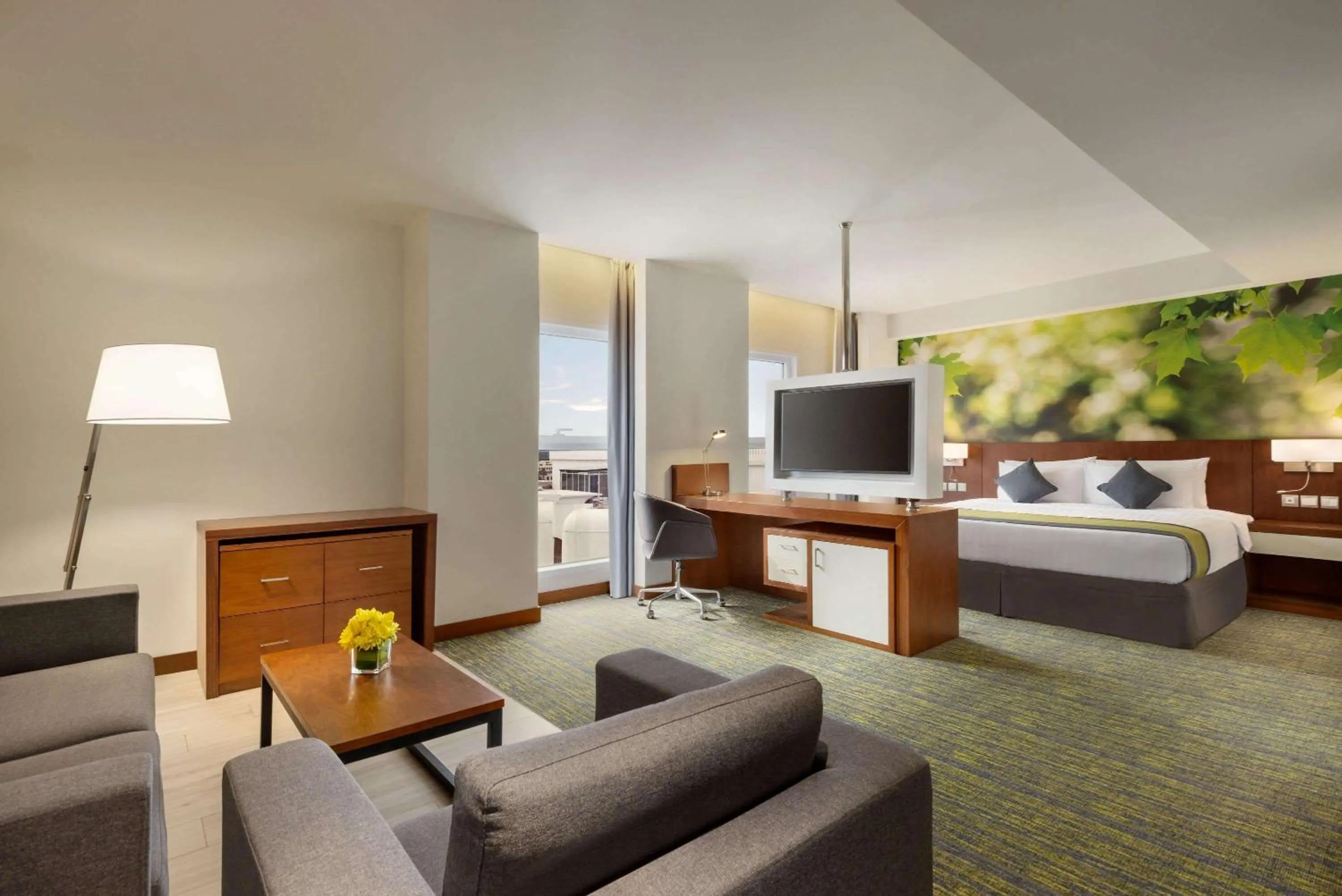 Photo of the whole room, Bed in Wyndham Garden Muscat Al Khuwair