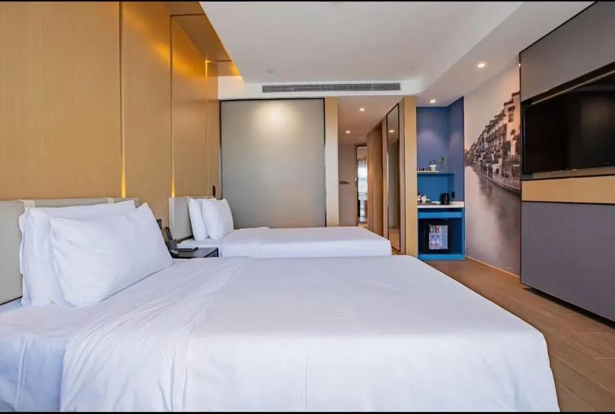 Bed in Atour Hotel Nanjing Olympic Center