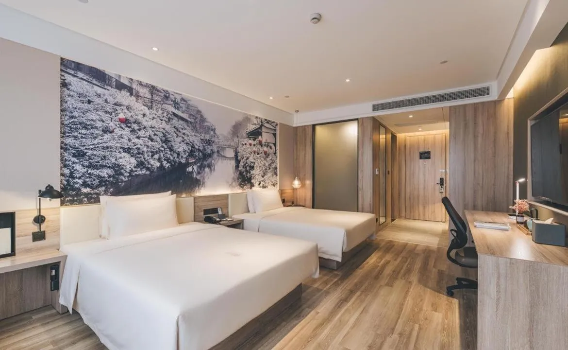 Bed in Atour Hotel Nanjing Xianlin Avenue Jinma Road