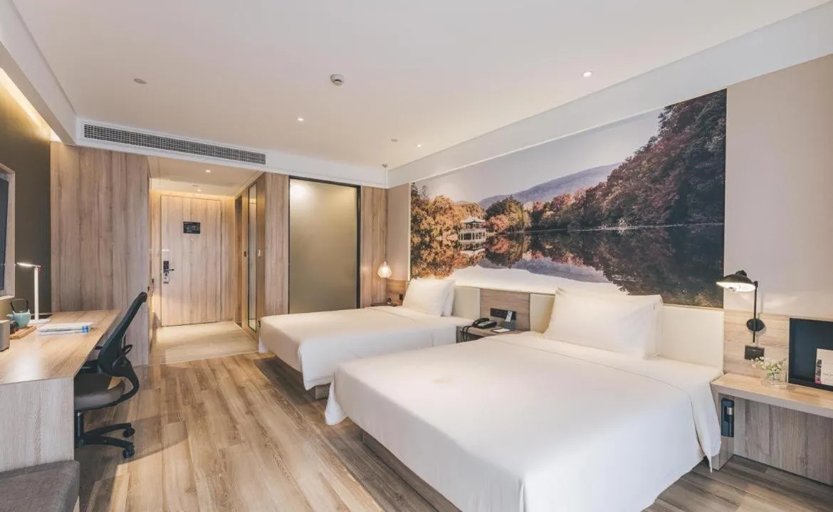 Bed in Atour Hotel Nanjing Xianlin Avenue Jinma Road