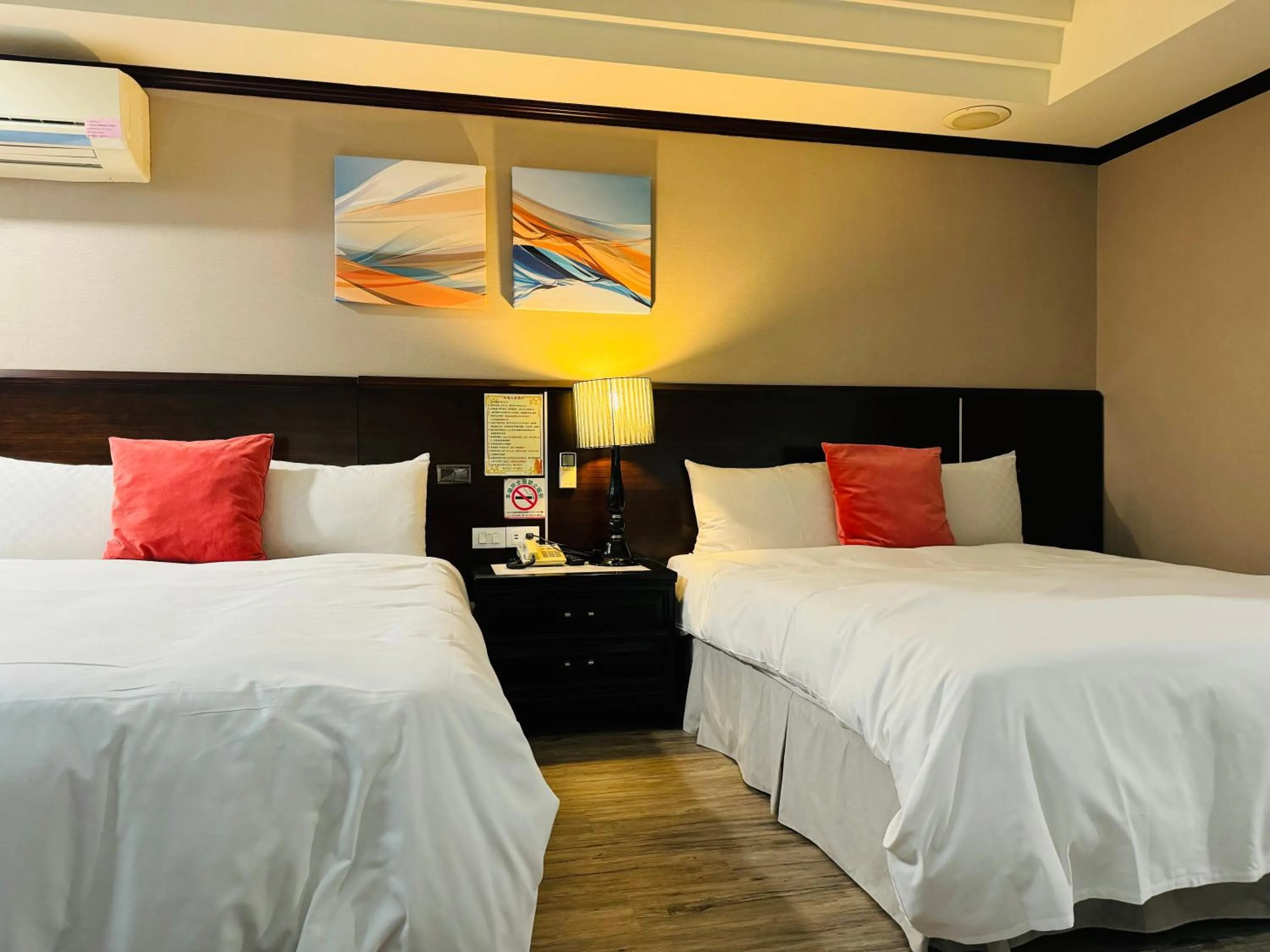 Bed in Felicity Business Hotel