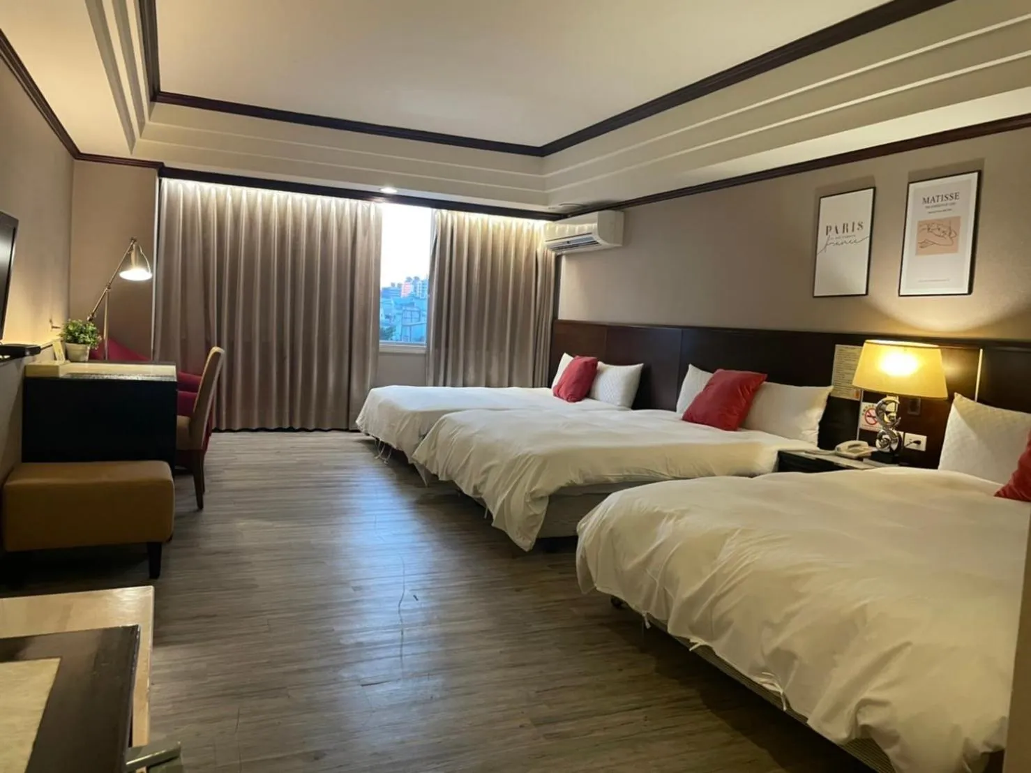 Bed in Felicity Business Hotel