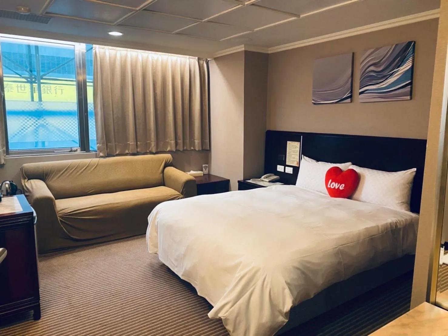 Bed in Felicity Business Hotel