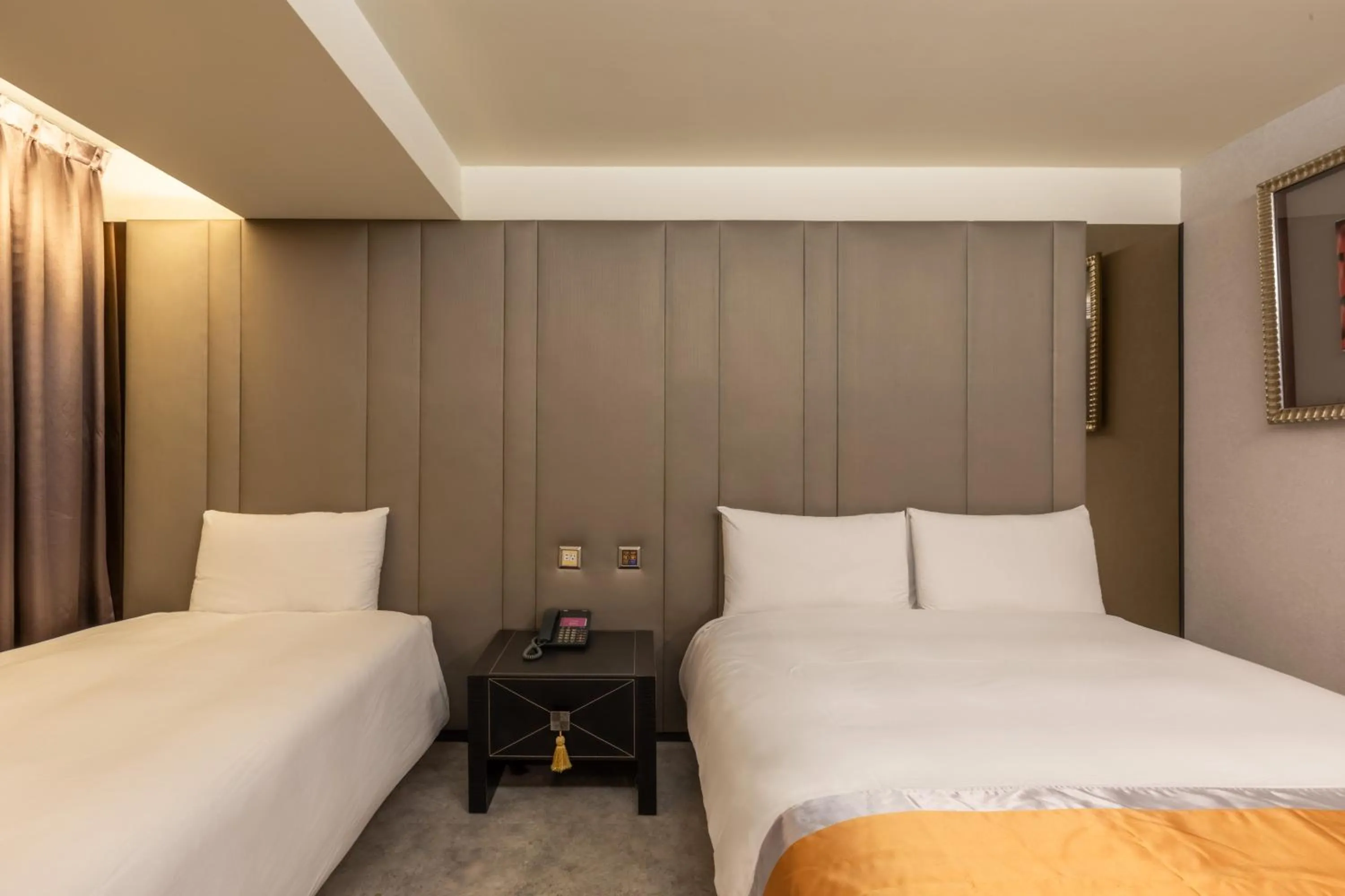 Bed in Ren Mei Fashion Hotel