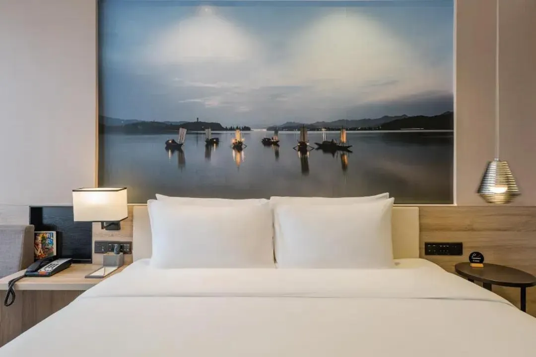 Bed in Atour Hotel Hangzhou Binjiang Jiangling Road