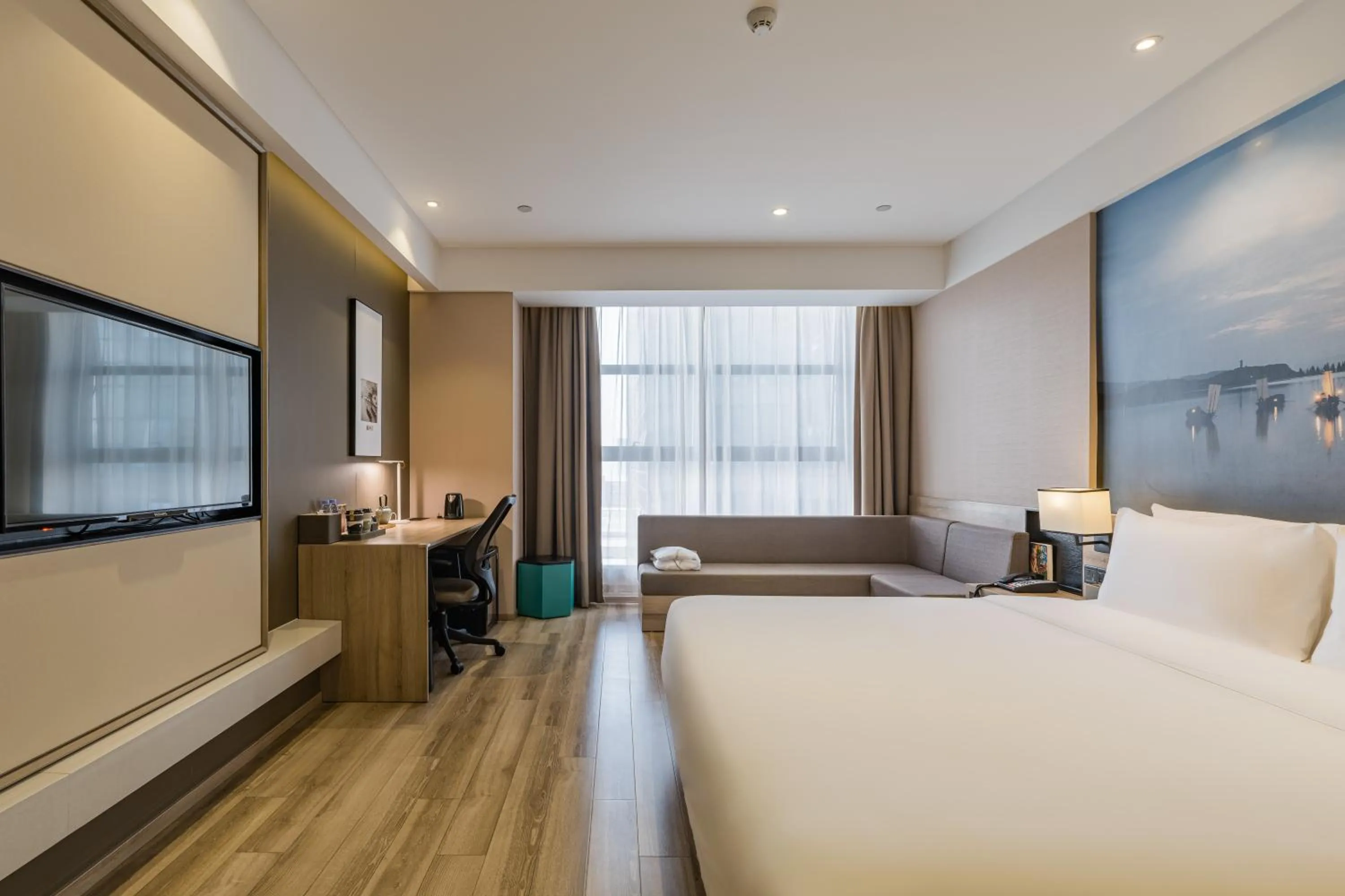 Photo of the whole room, Bed in Atour Hotel Hangzhou Binjiang Jiangling Road