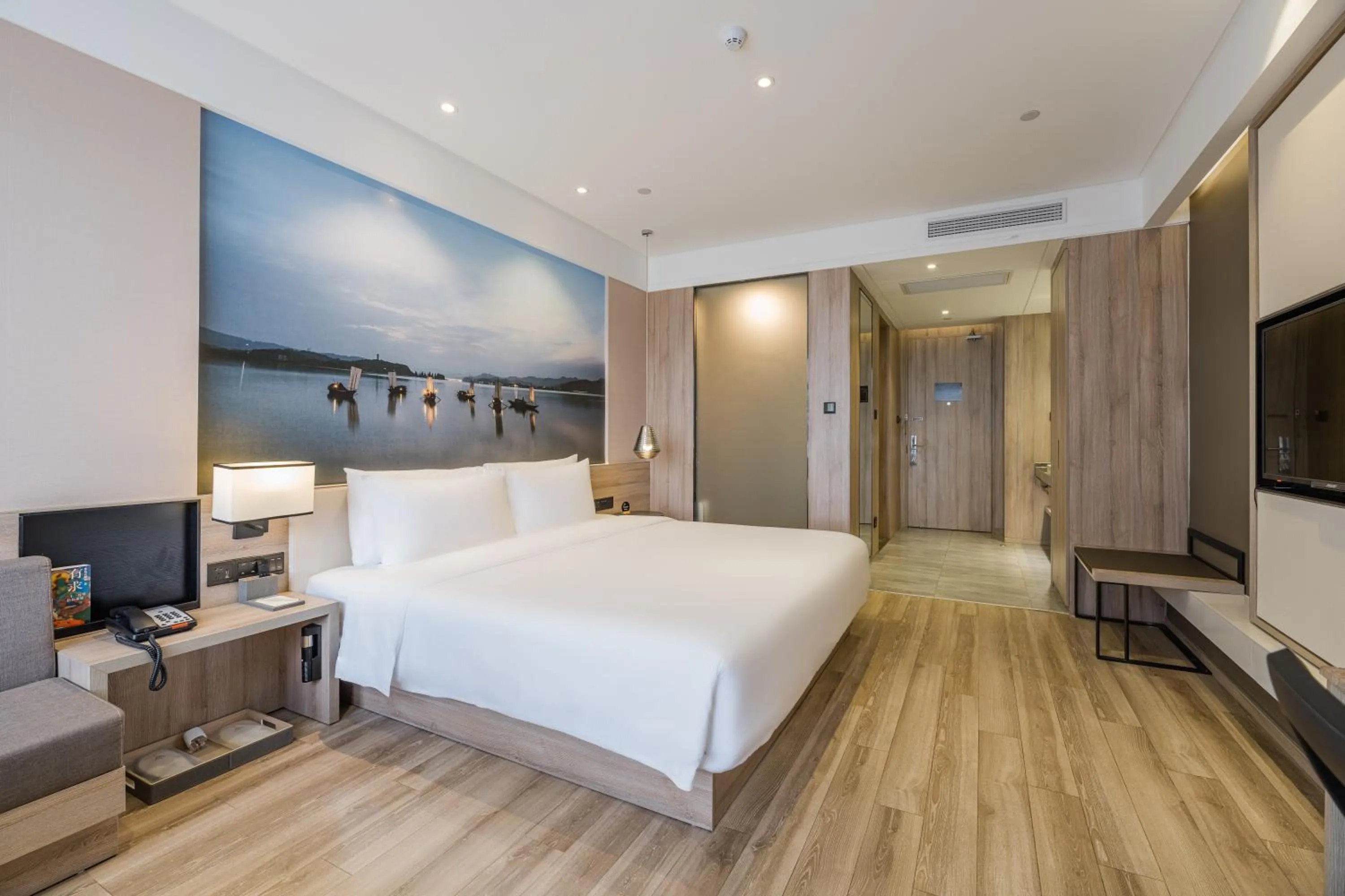 Photo of the whole room, Bed in Atour Hotel Hangzhou Binjiang Jiangling Road