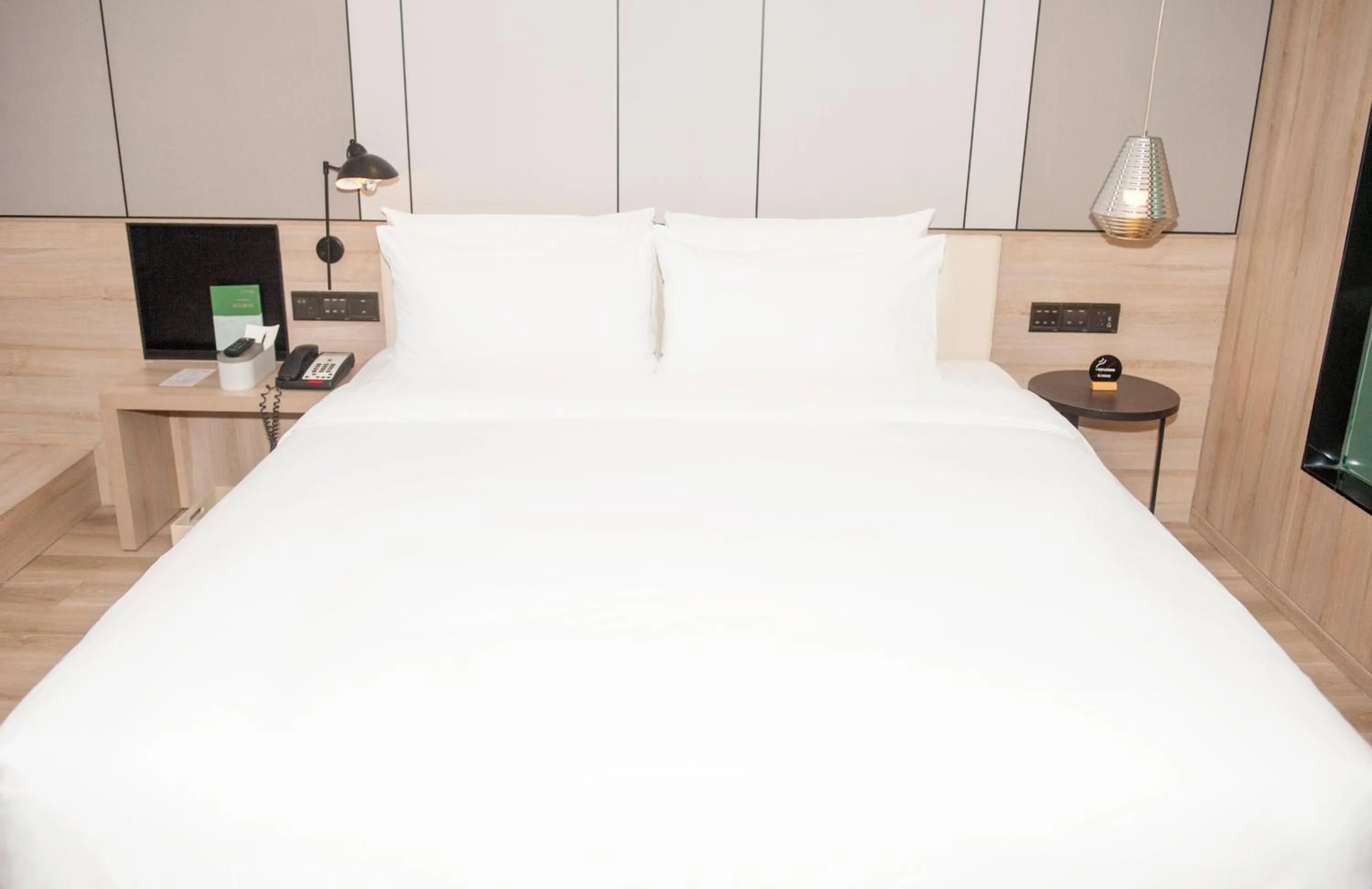 Bed in Atour Hotel High Speed Railway North Station Zibo Hi tech Zone