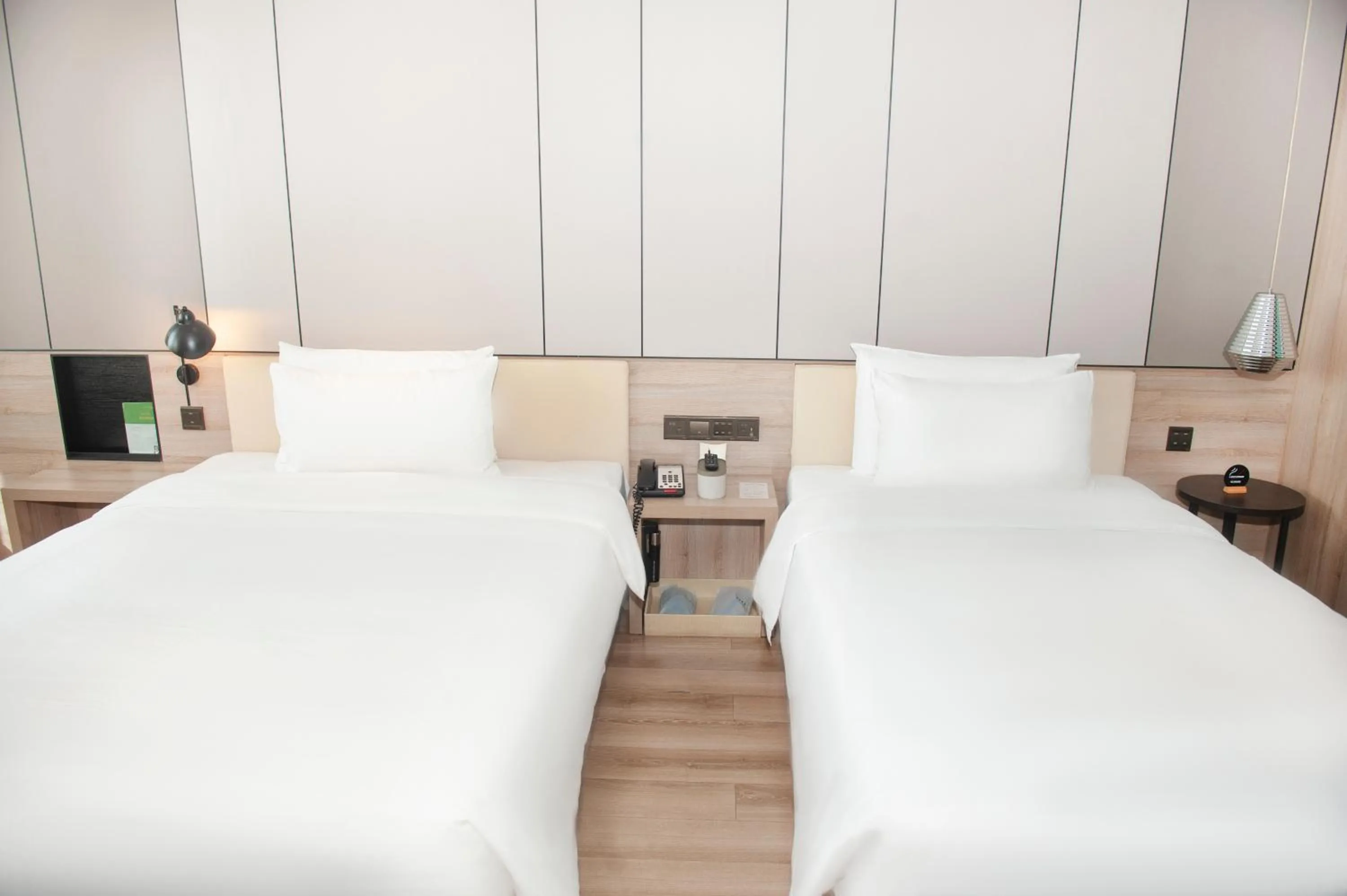 Bed in Atour Hotel High Speed Railway North Station Zibo Hi tech Zone