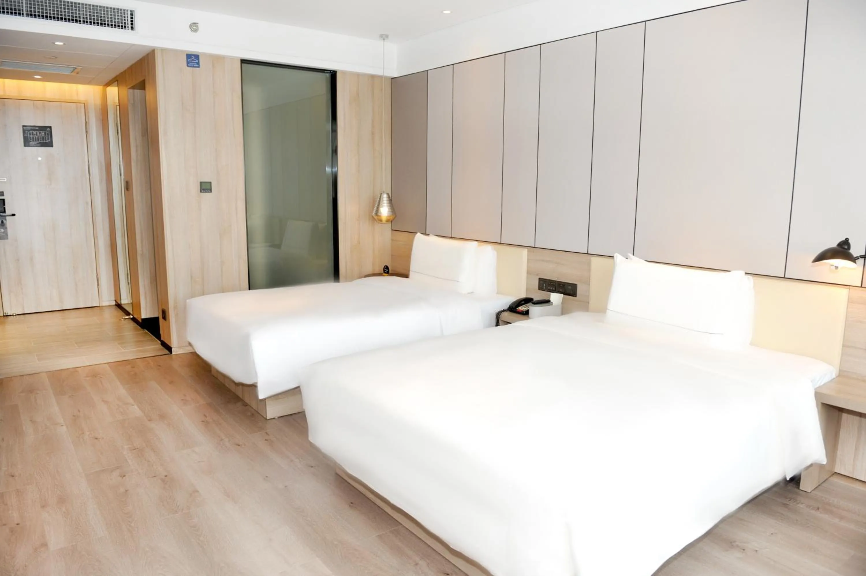 Photo of the whole room, Bed in Atour Hotel High Speed Railway North Station Zibo Hi tech Zone