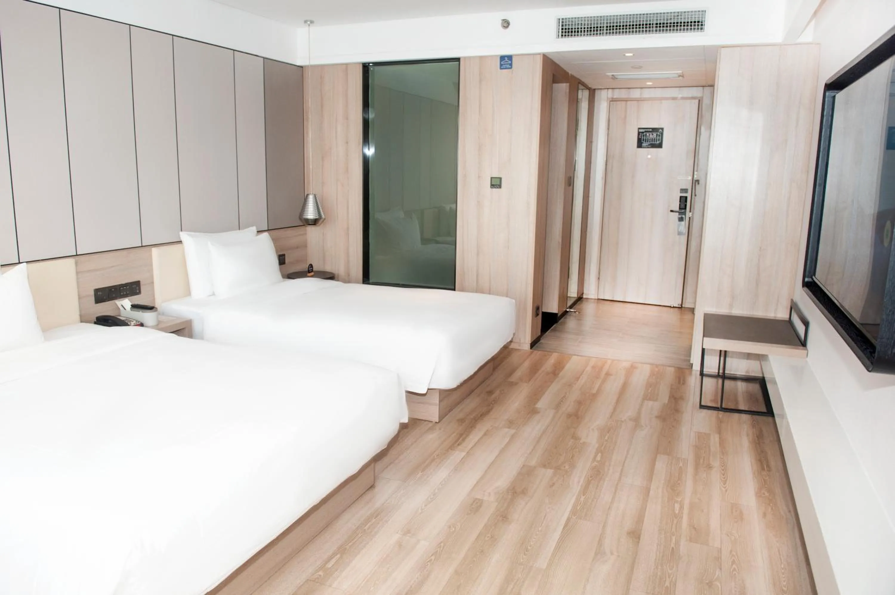 Bed in Atour Hotel High Speed Railway North Station Zibo Hi tech Zone