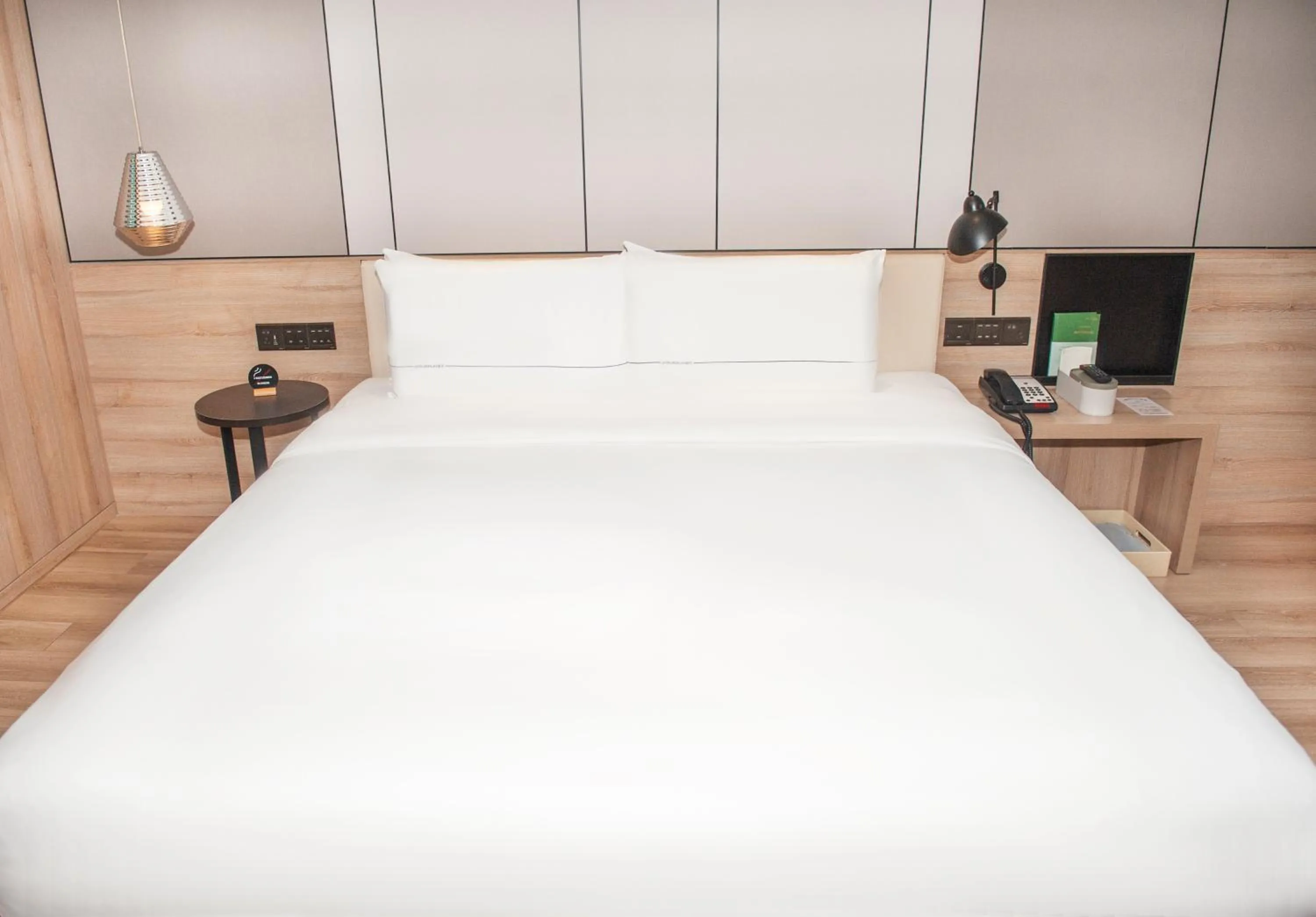 Bed in Atour Hotel High Speed Railway North Station Zibo Hi tech Zone