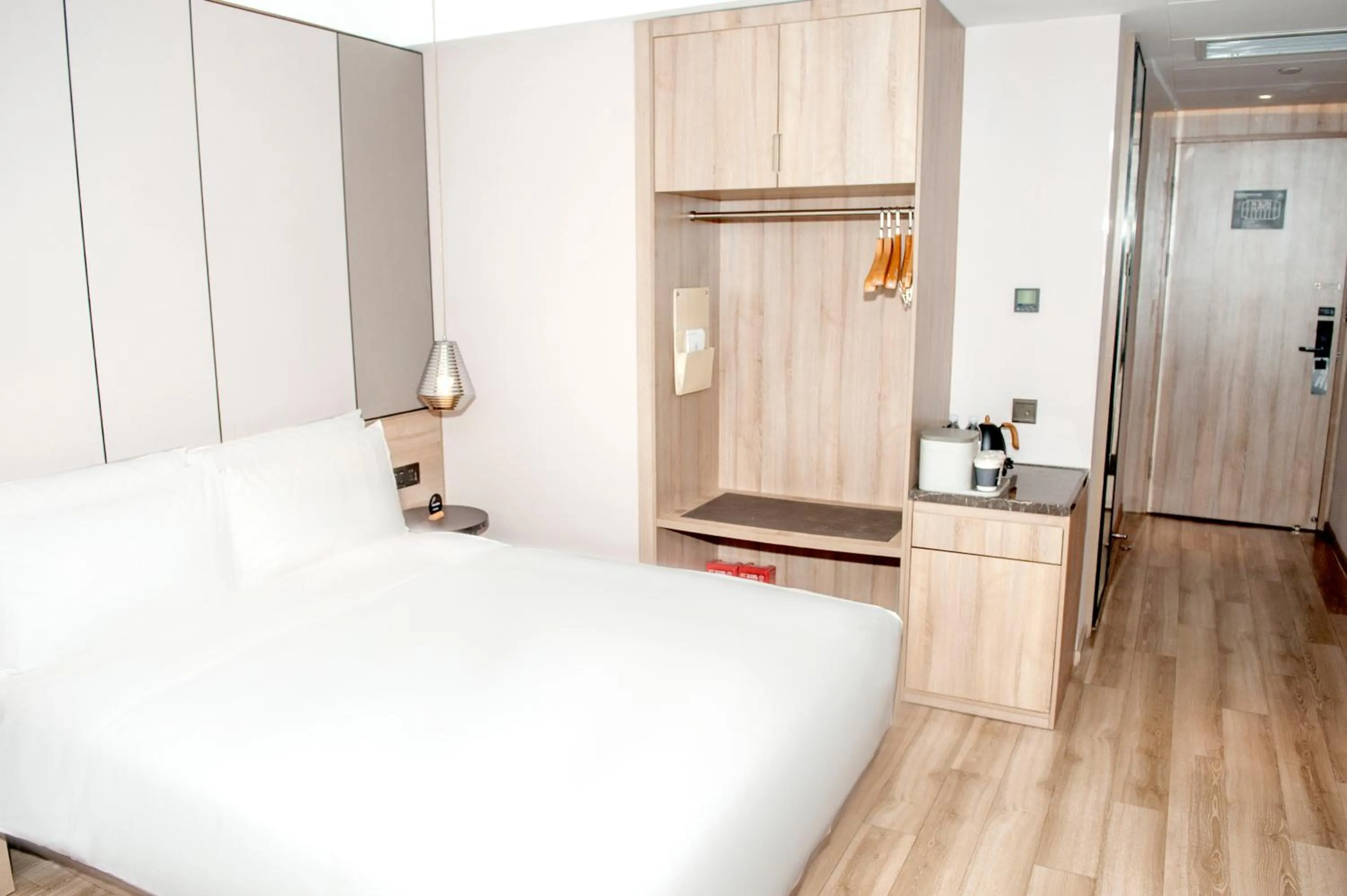 Bed in Atour Hotel High Speed Railway North Station Zibo Hi tech Zone