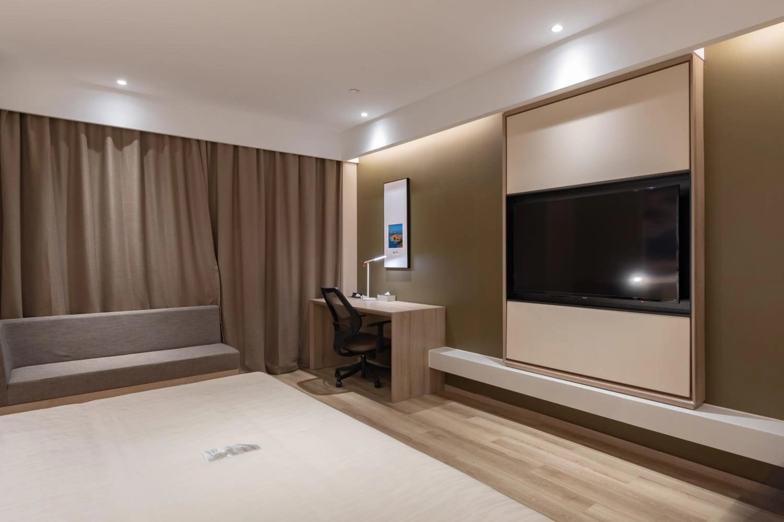 Bed in Atour Hotel (Suzhou Wujiang Wuyue Plaza)