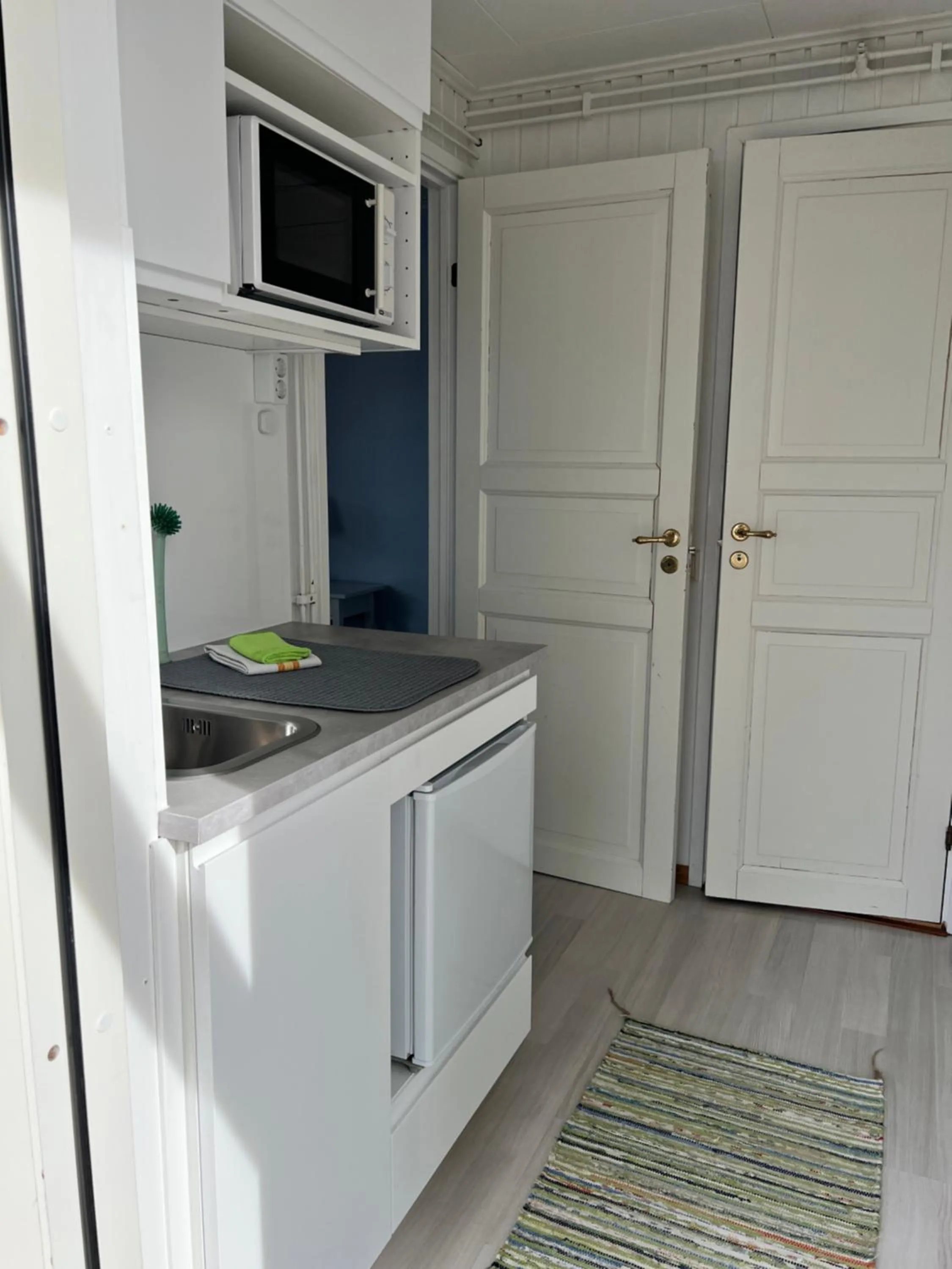 Kitchen or kitchenette in Sangis Motell och Camping
