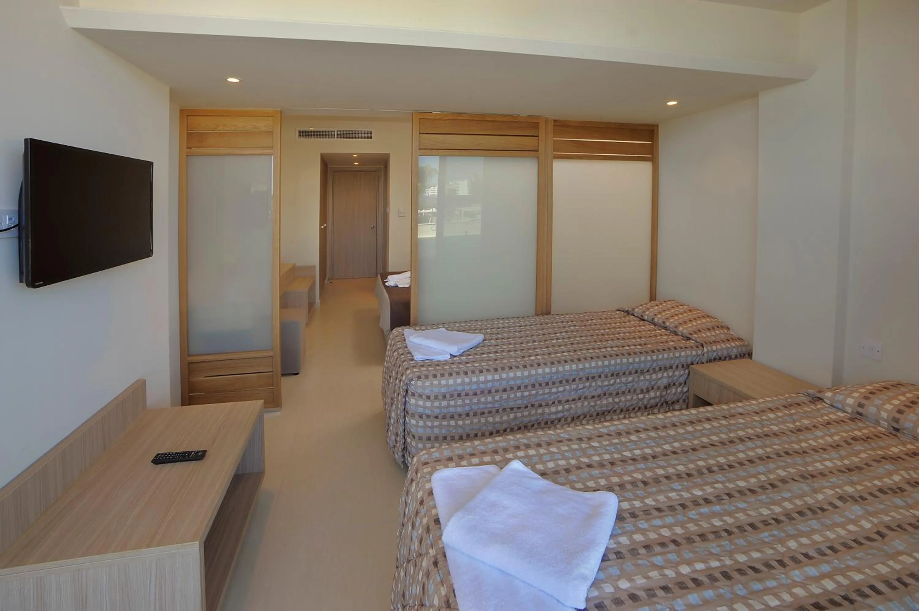 Photo of the whole room, Bed in Nelia Beach Hotel & Spa