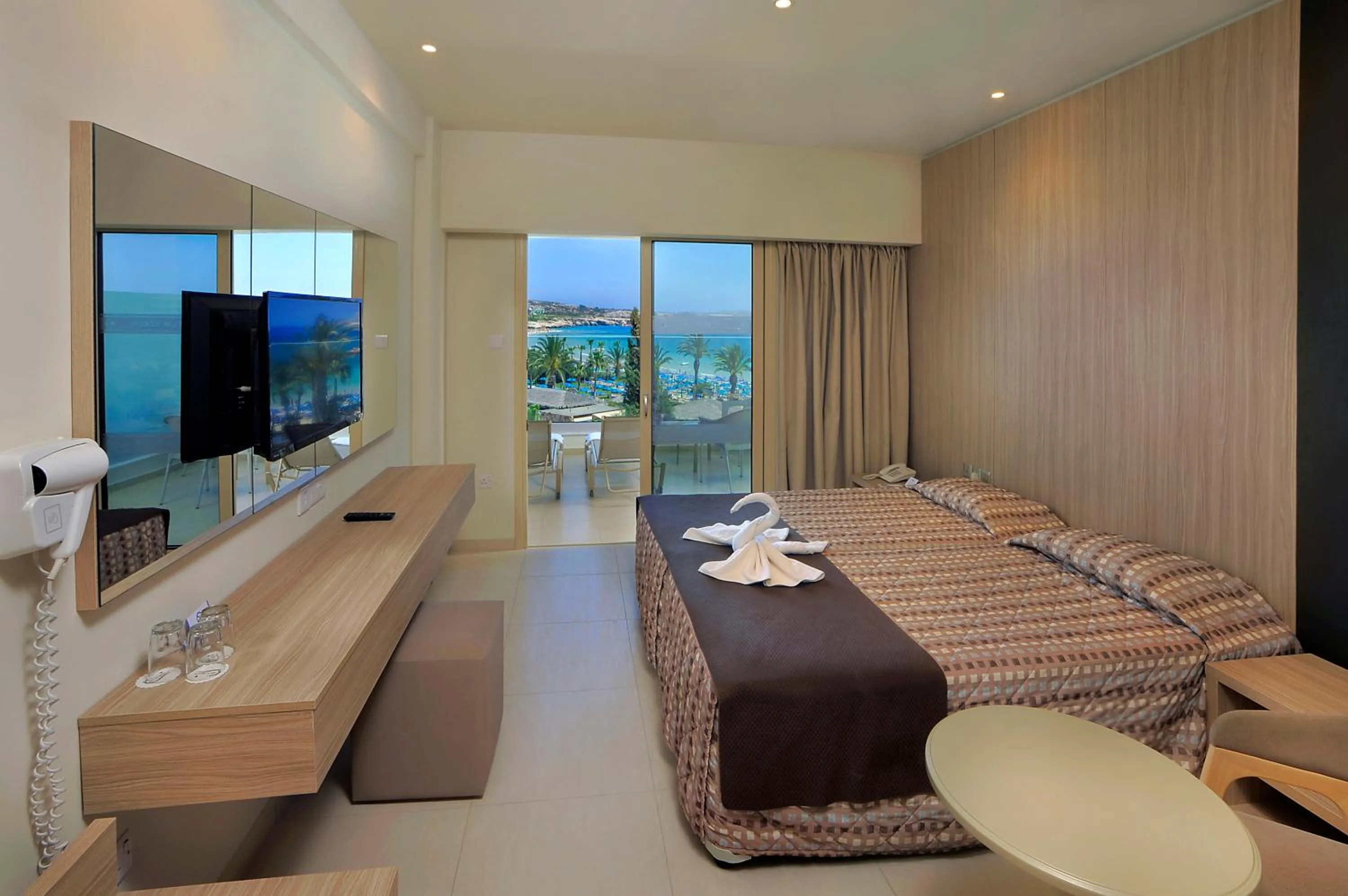 Photo of the whole room, Bed in Nelia Beach Hotel & Spa
