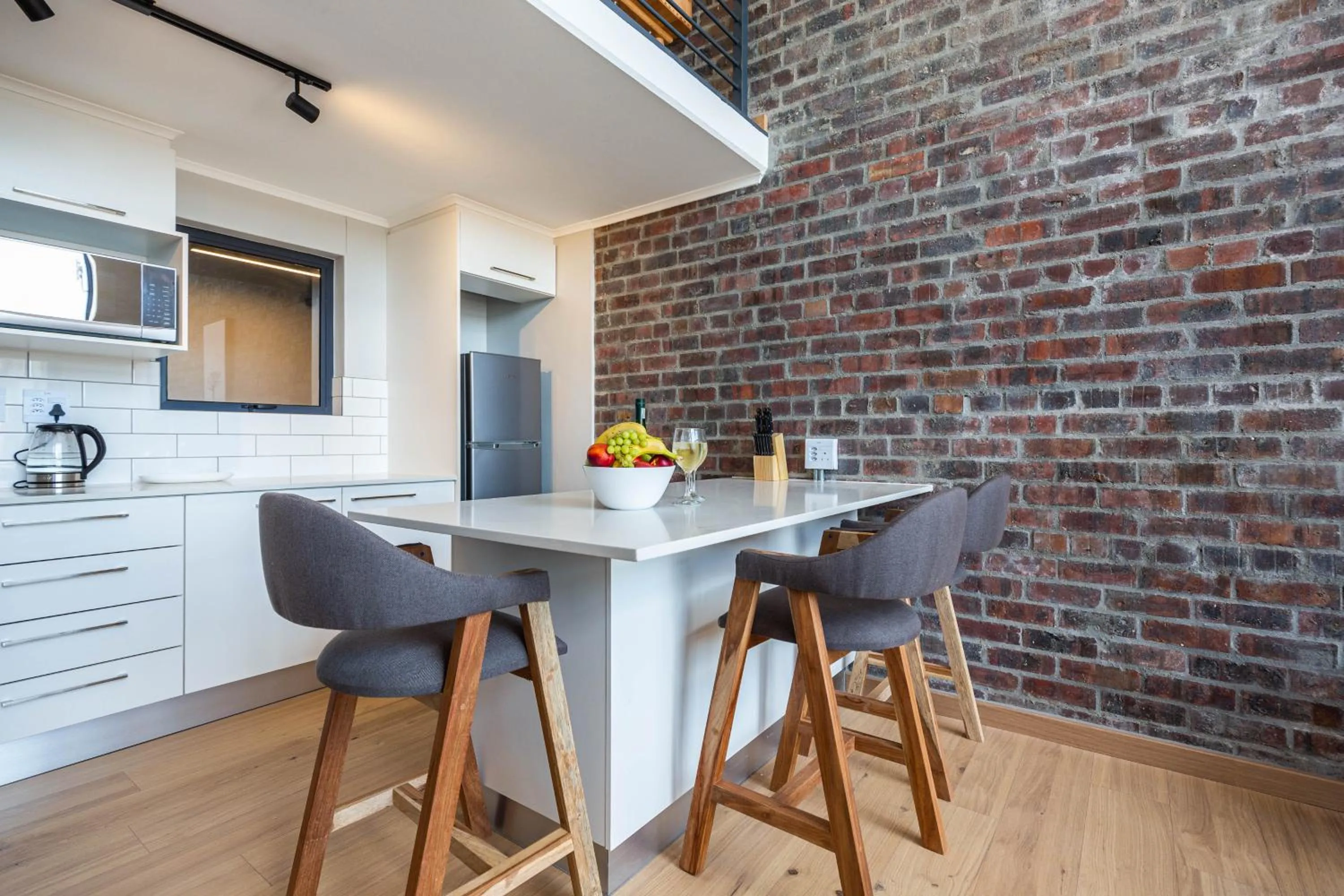 Dining area in Urban Artisan Luxury Suites by Totalstay