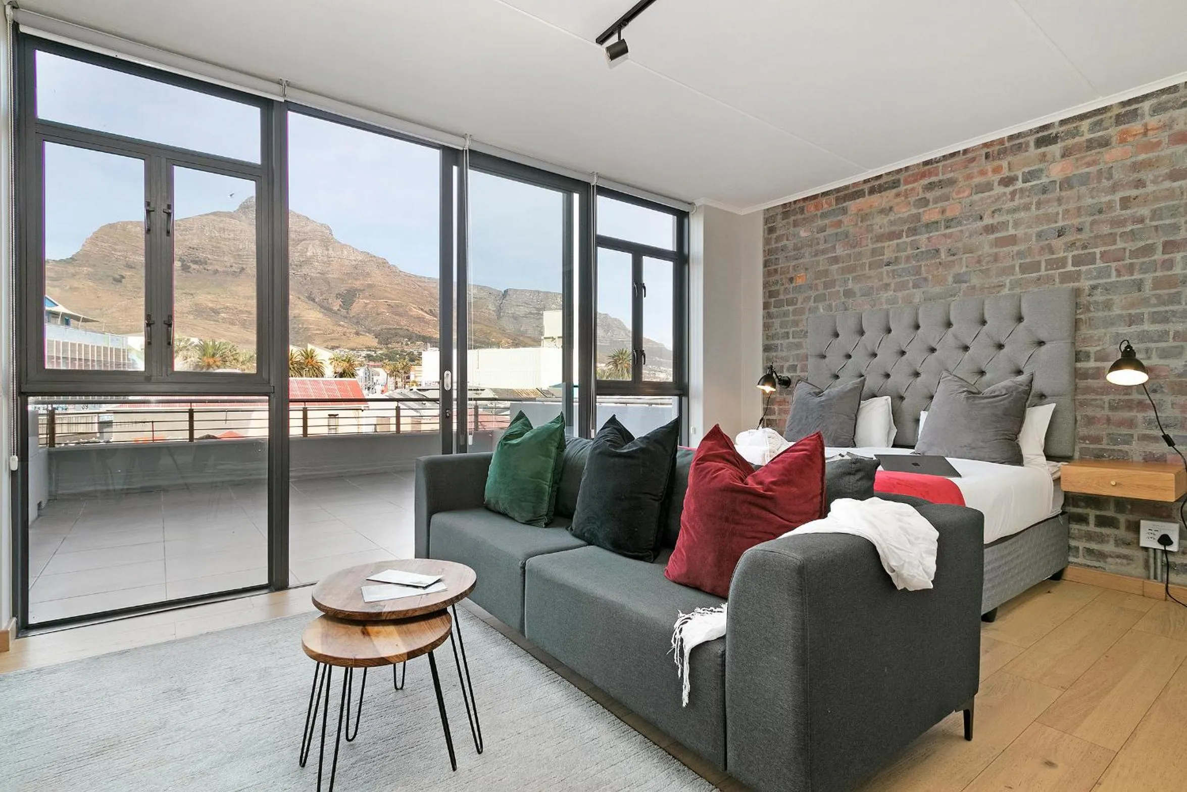 Living room, Bed in Urban Artisan Luxury Suites by Totalstay