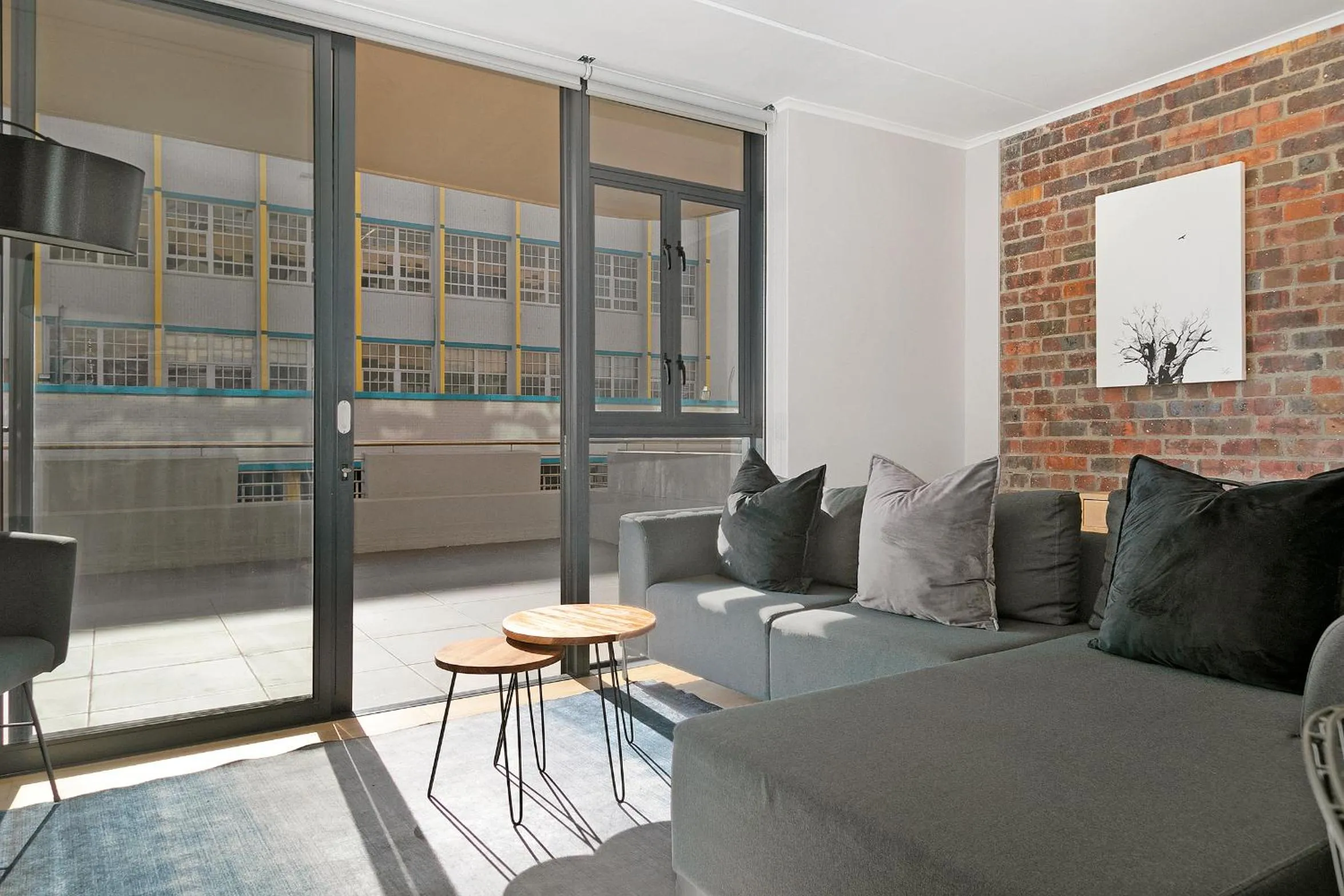 Living room in Urban Artisan Luxury Suites by Totalstay