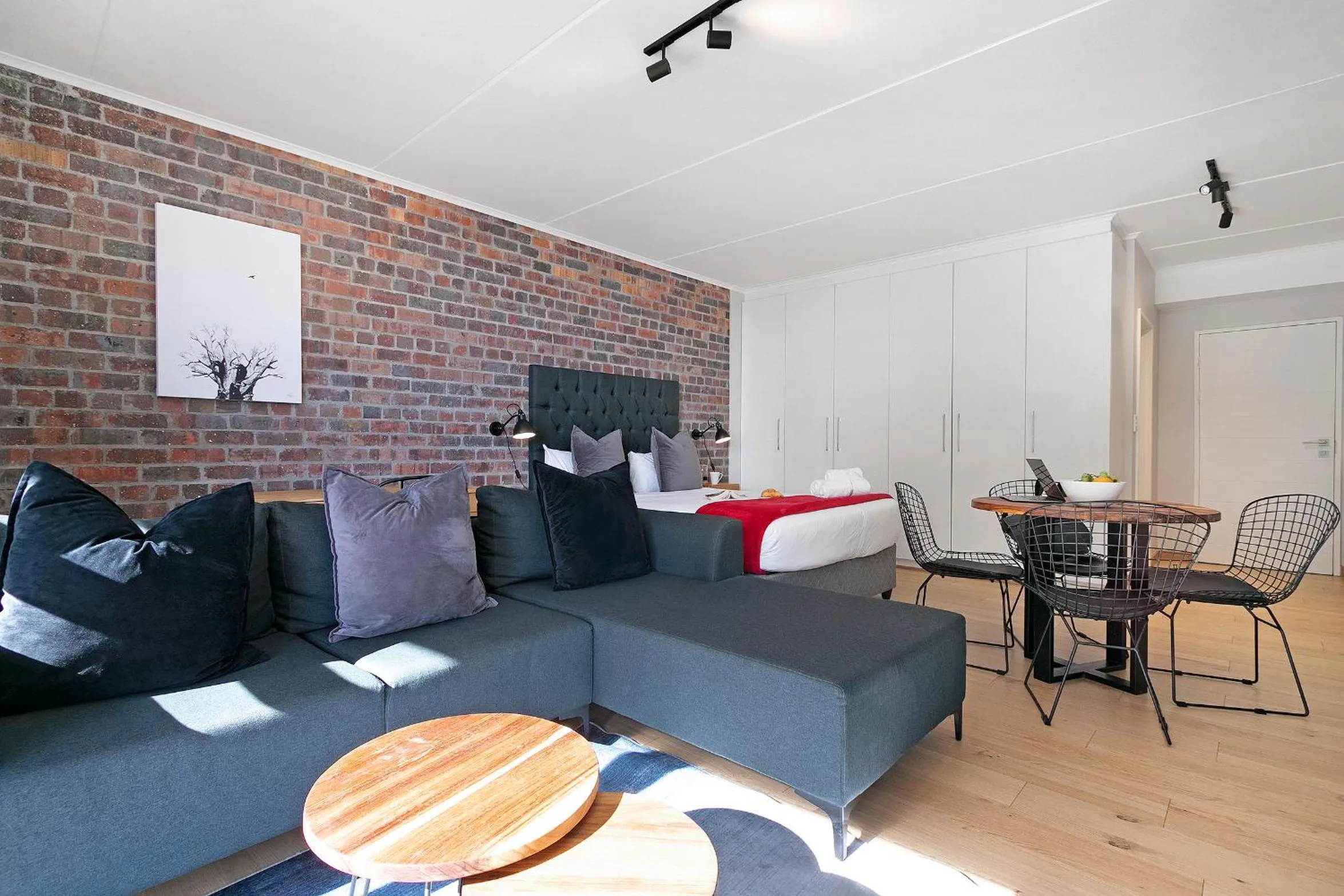 Photo of the whole room in Urban Artisan Luxury Suites by Totalstay