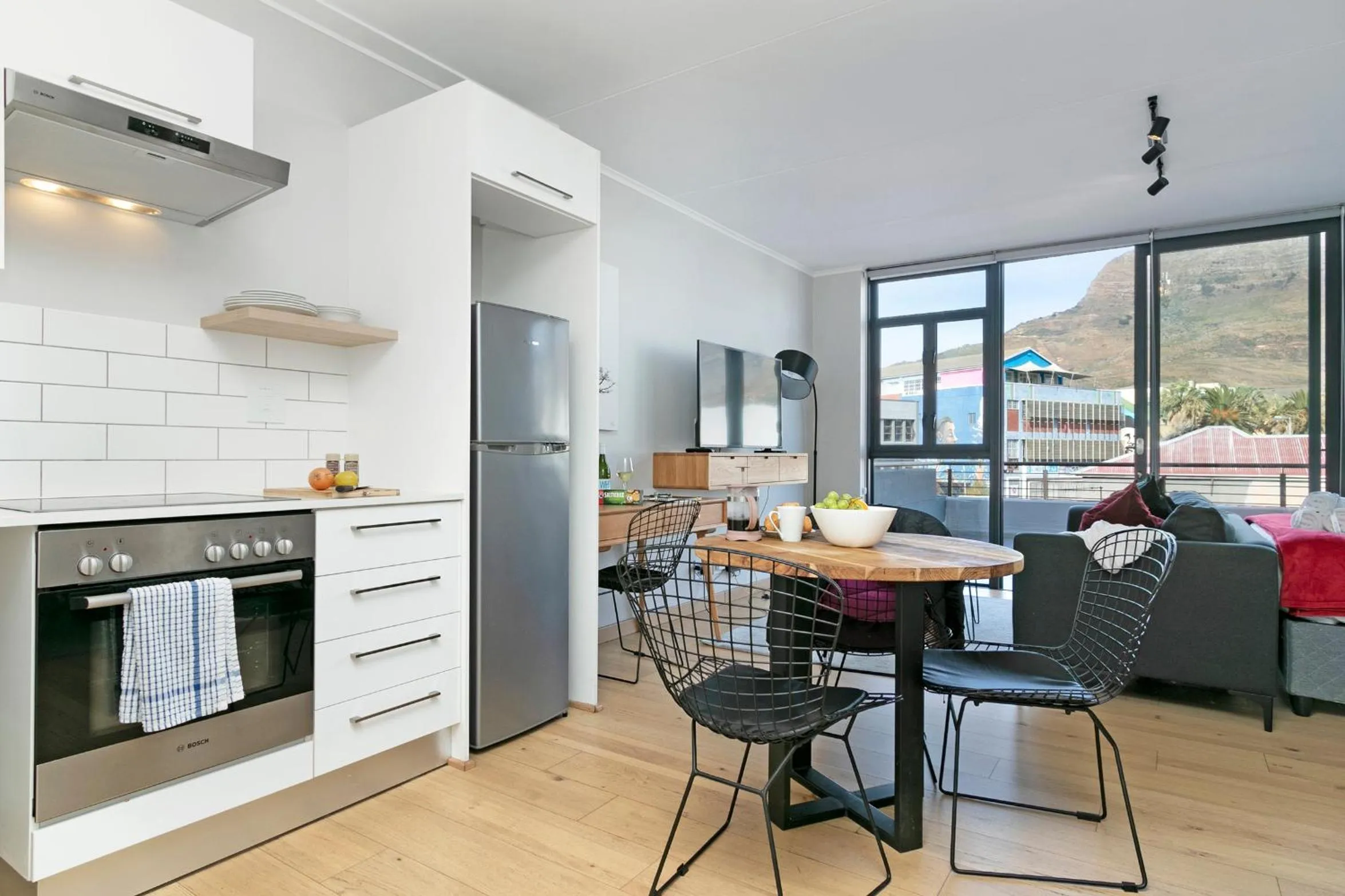 Dining area in Urban Artisan Luxury Suites by Totalstay