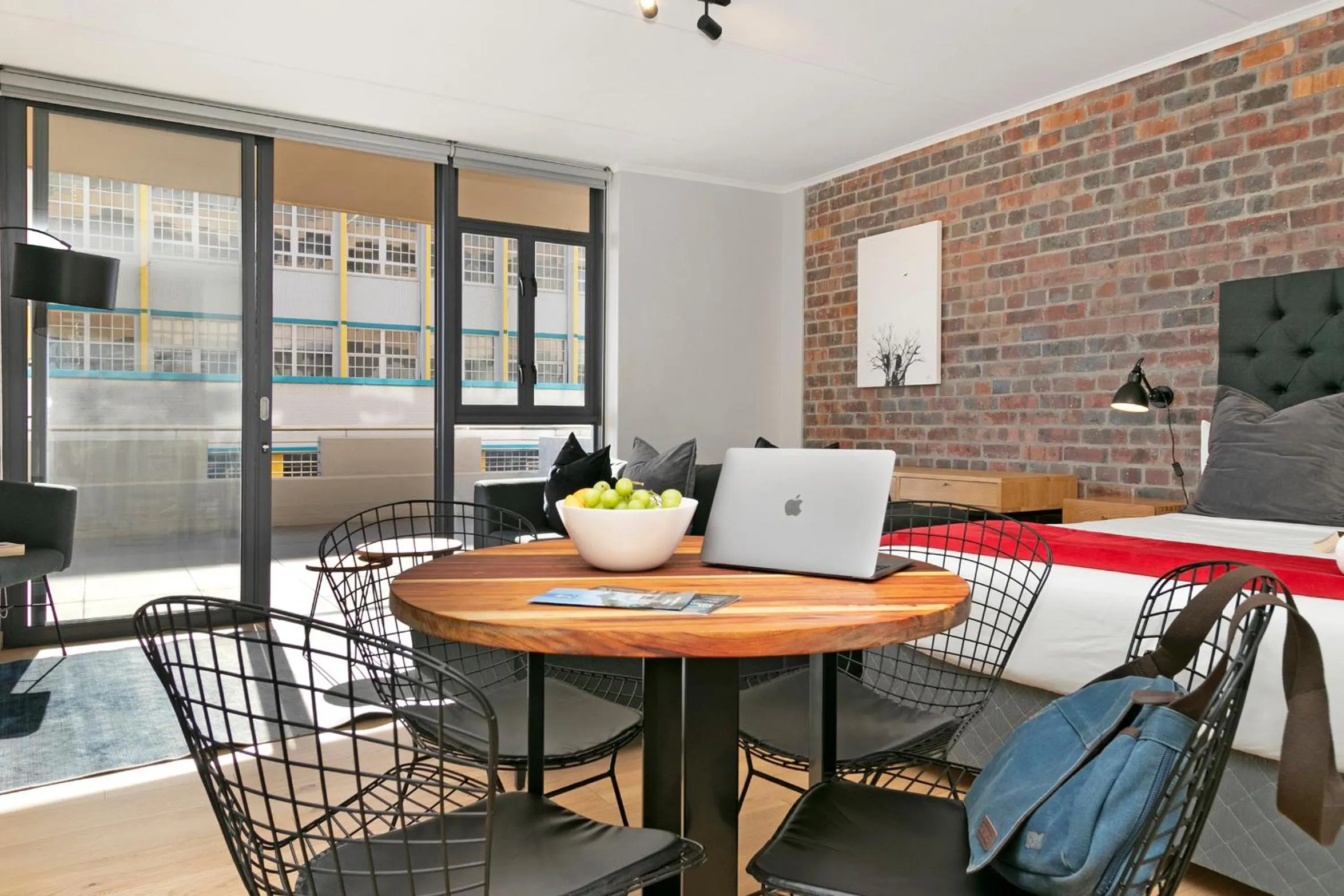 Photo of the whole room in Urban Artisan Luxury Suites by Totalstay