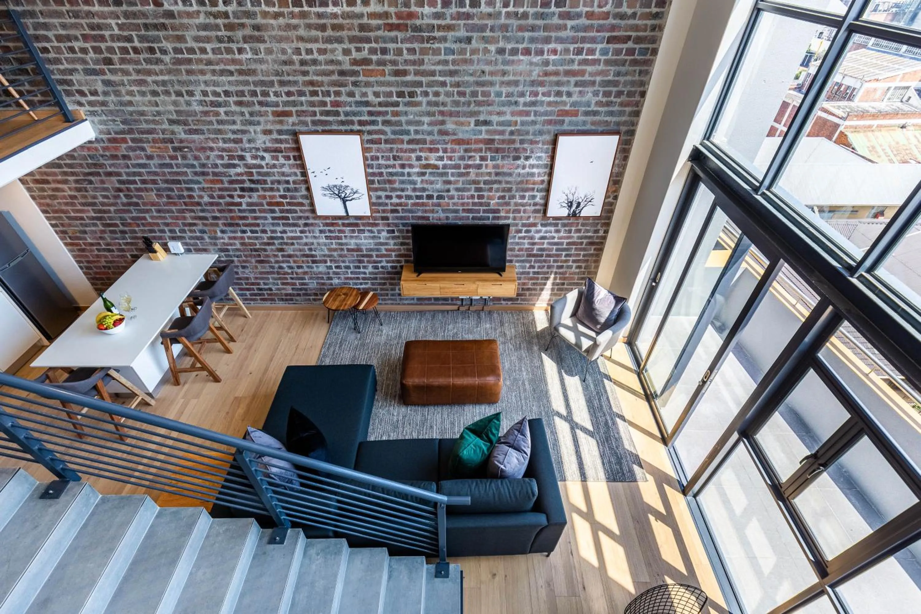 Living room in Urban Artisan Luxury Suites by Totalstay