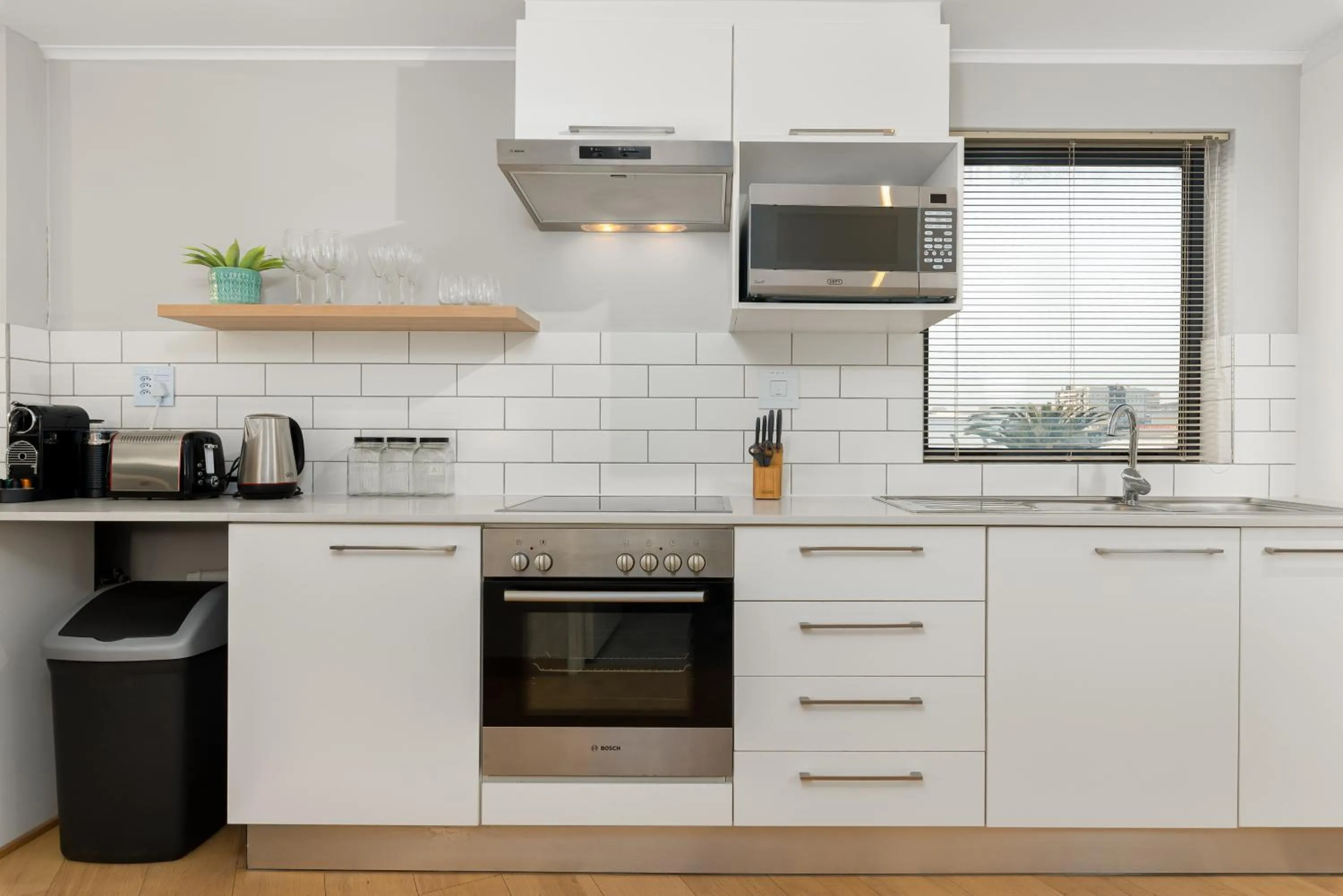 Kitchen or kitchenette in Urban Artisan Luxury Suites by Totalstay