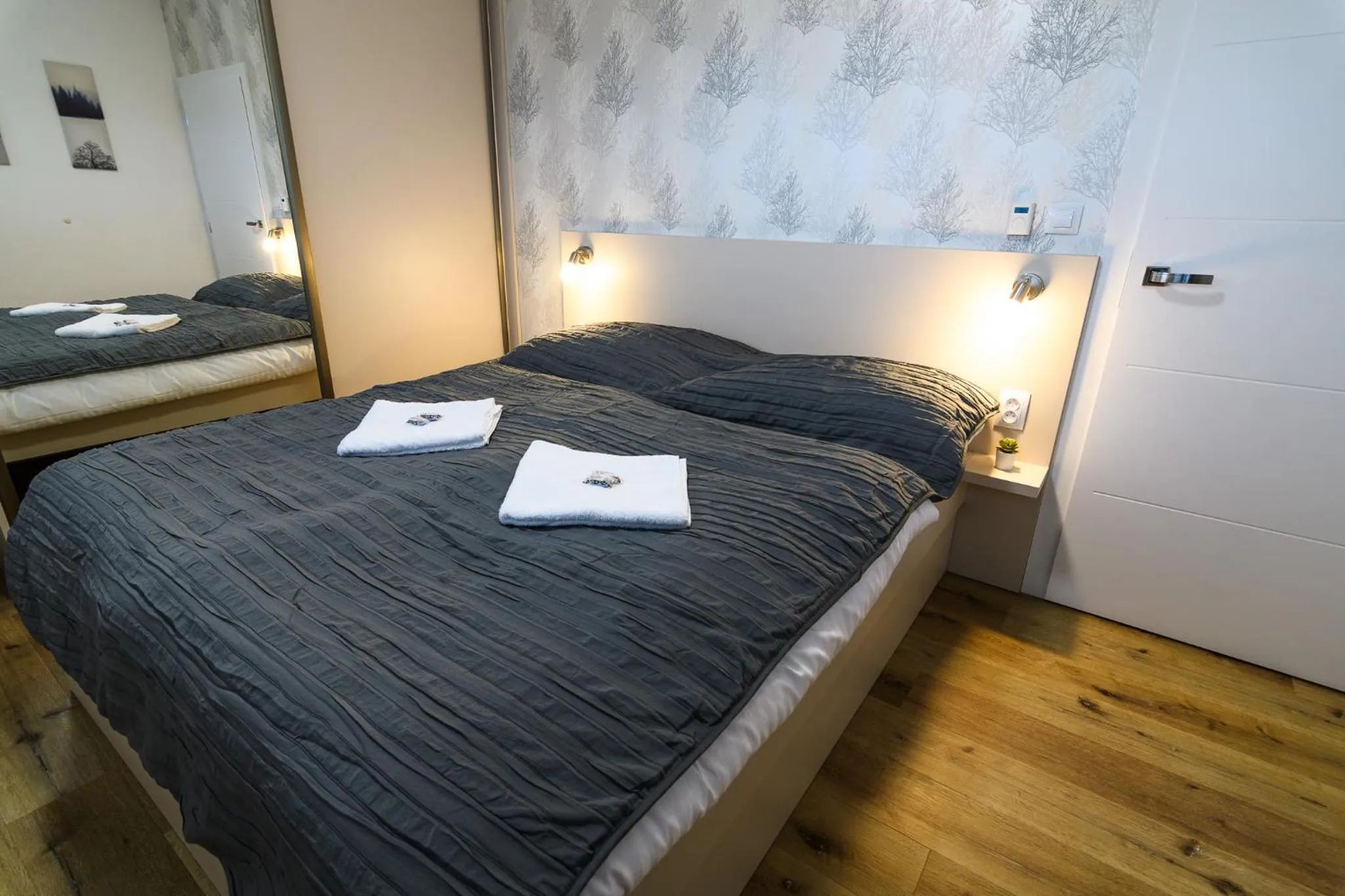 Bed in Apartmány NMNM REZIDENCE NAD MĚSTEM