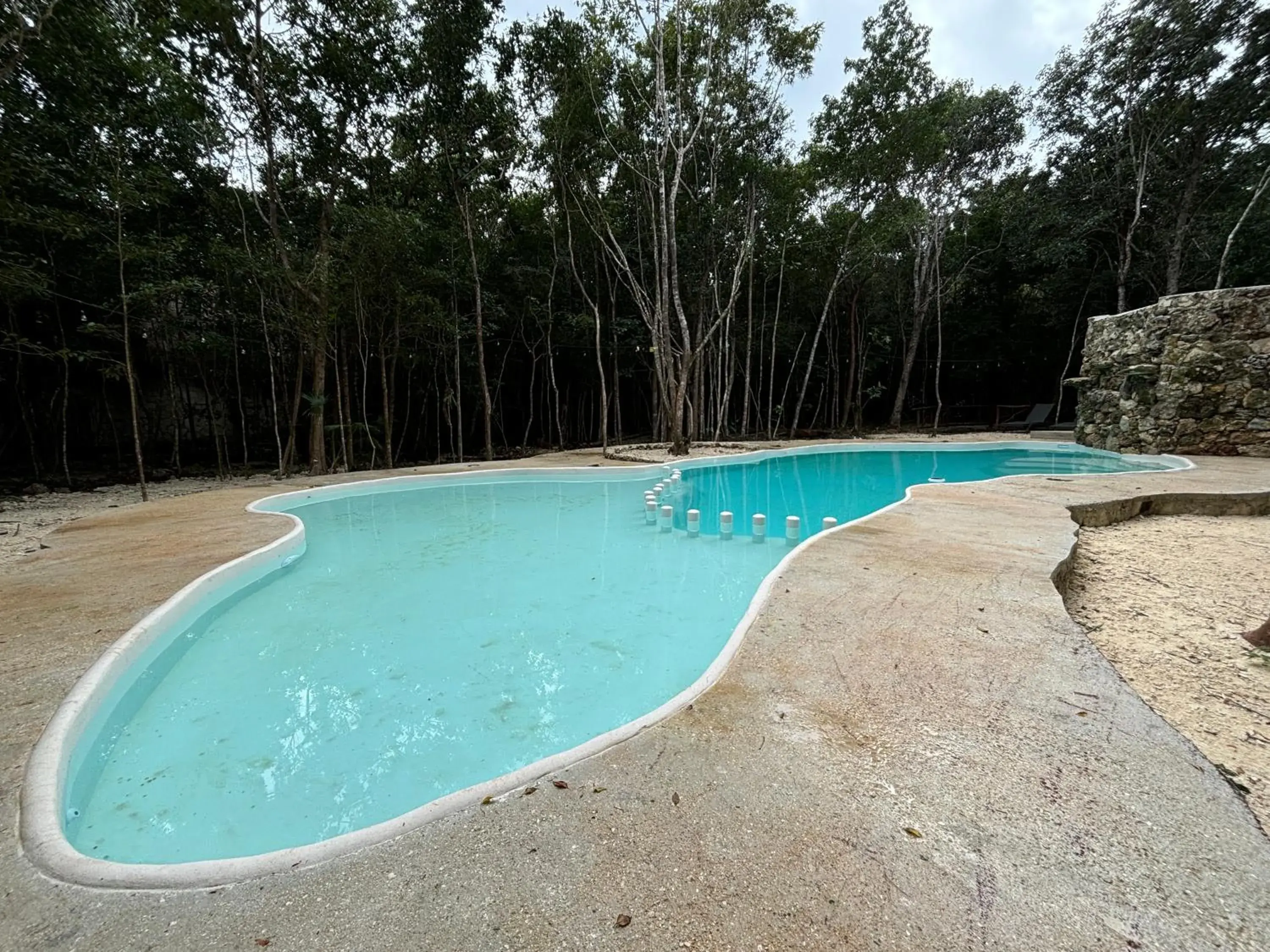 Swimming pool in Aldea Maya-Ha Cabañas con cenotes Swimming pool in Aldea Maya-Ha Cabañas con cenotes
