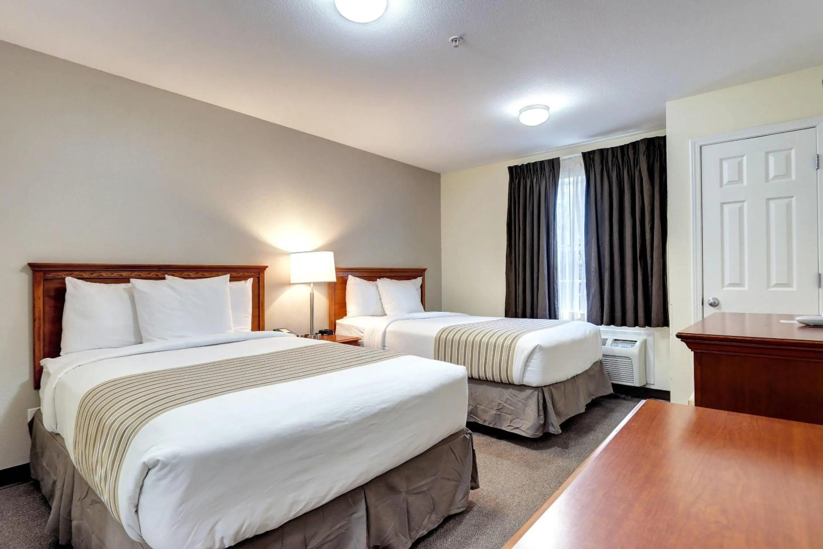 Bedroom, Bed in Suburban Studios Westminster Denver North