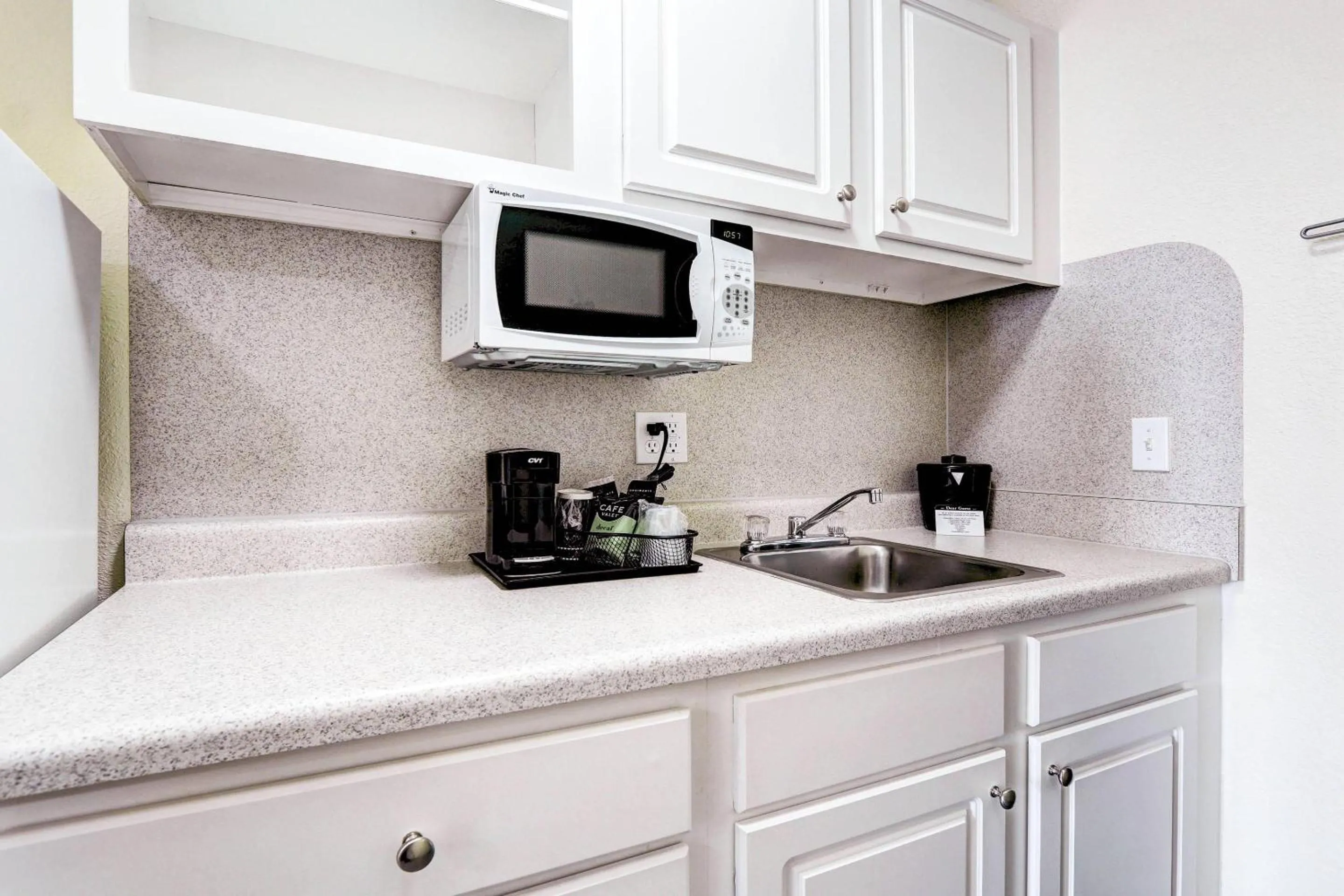 Bedroom in Suburban Studios Westminster Denver North