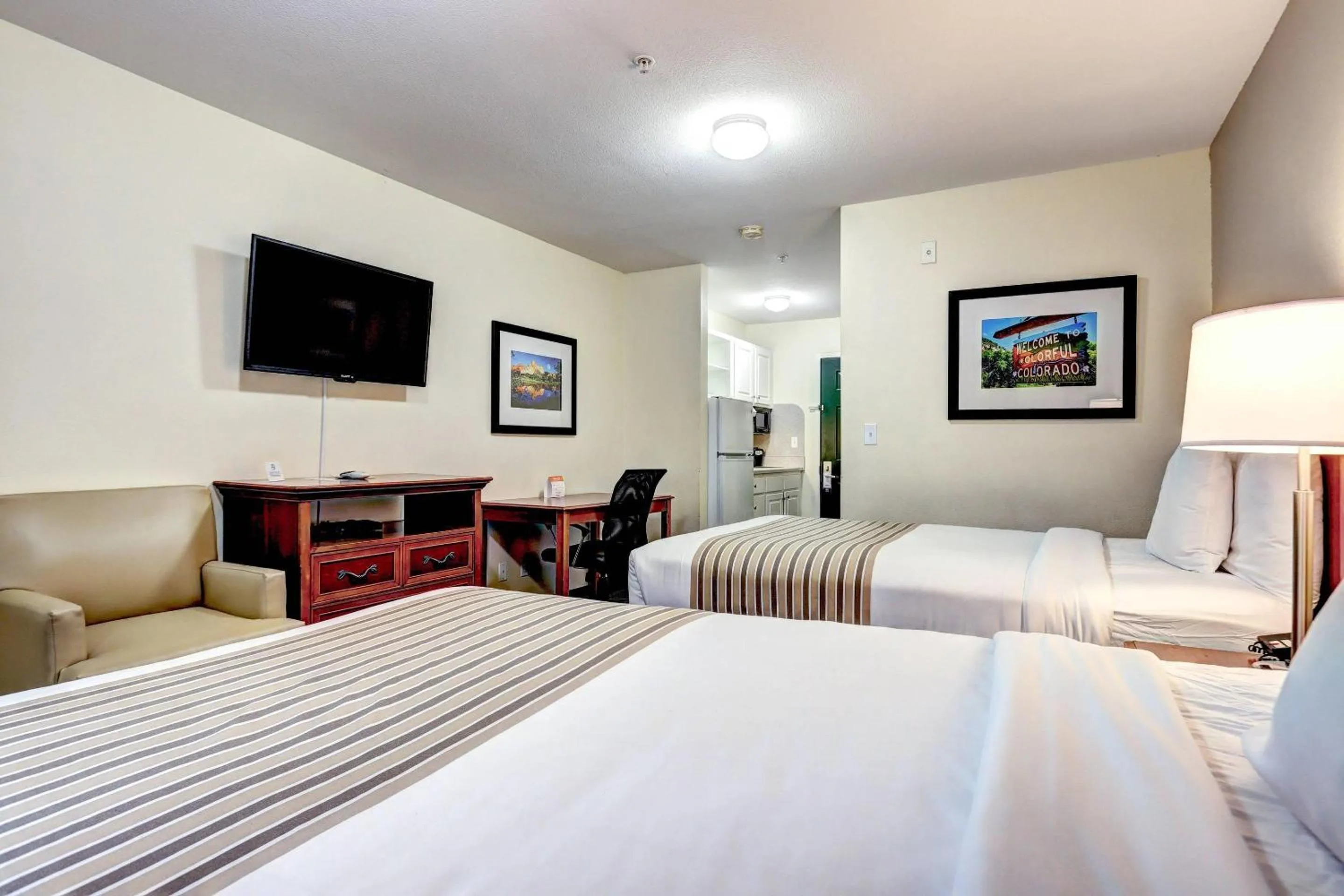 Bedroom, Bed in Suburban Studios Westminster Denver North