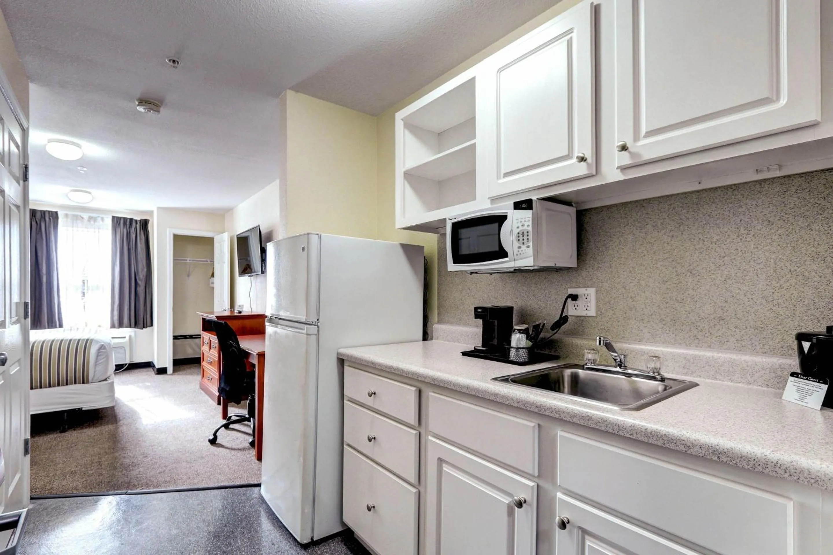 Bedroom in Suburban Studios Westminster Denver North