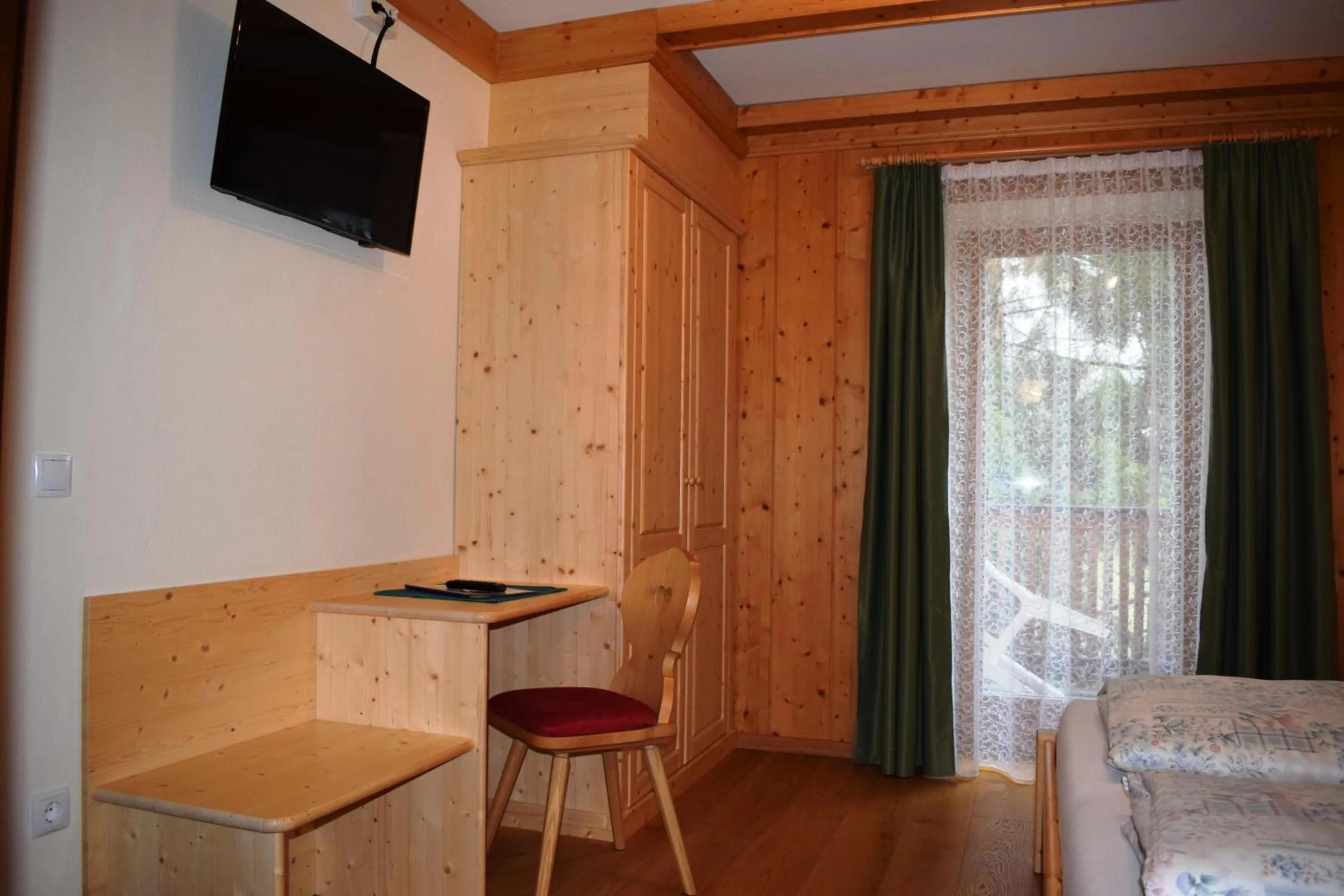 Bedroom in Garni Appartments Helvetia