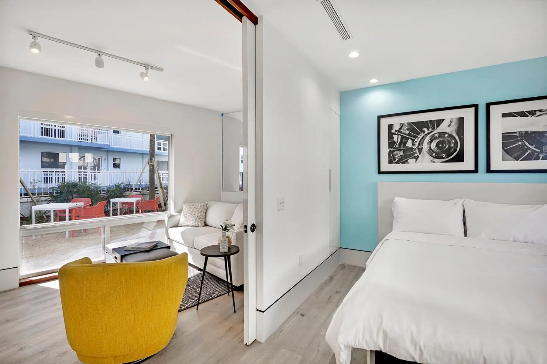 Living room, Bed in Ocean Treasure Beachside Suites