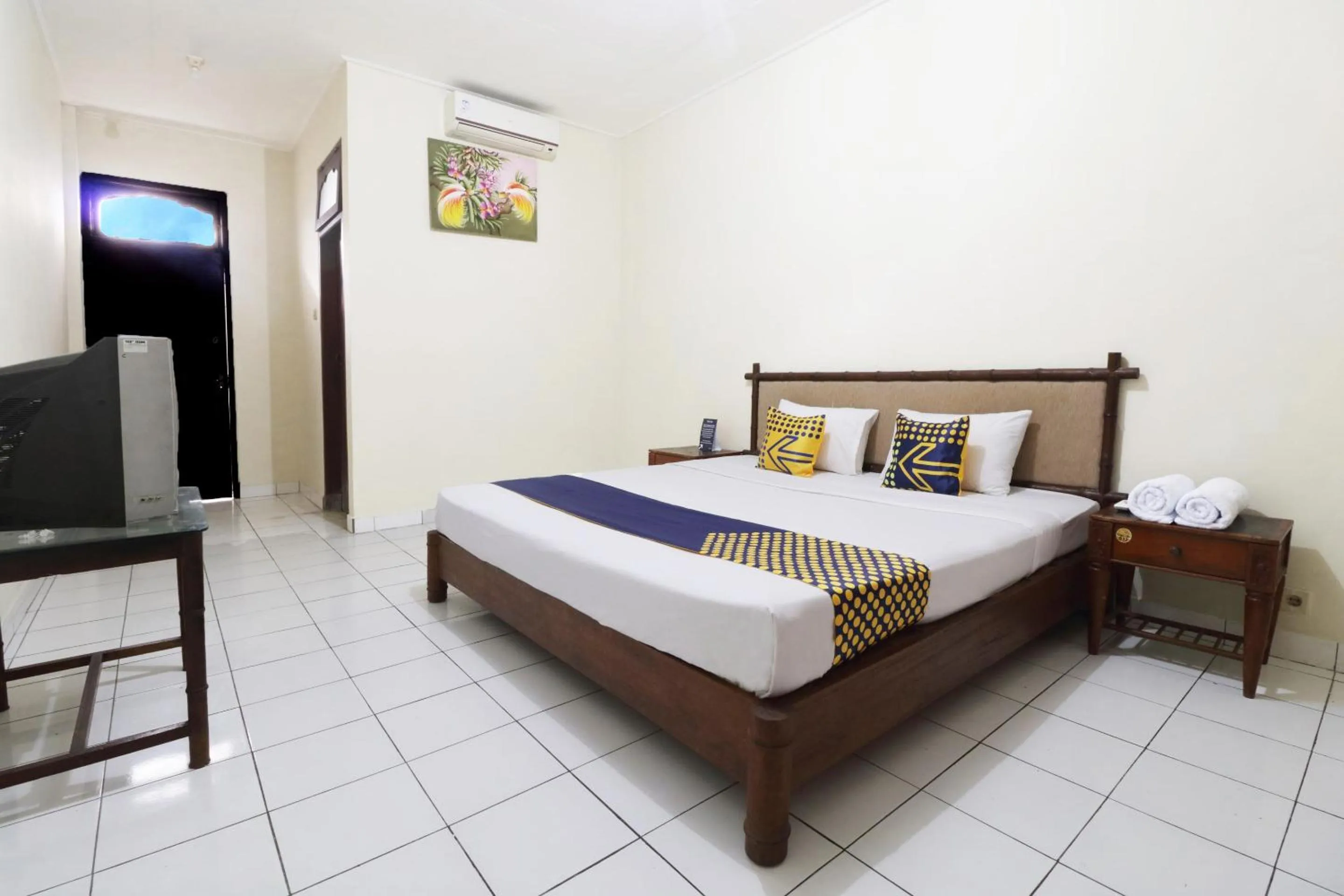 Bedroom in SPOT ON 2426 Hotel Aget Jaya Ii