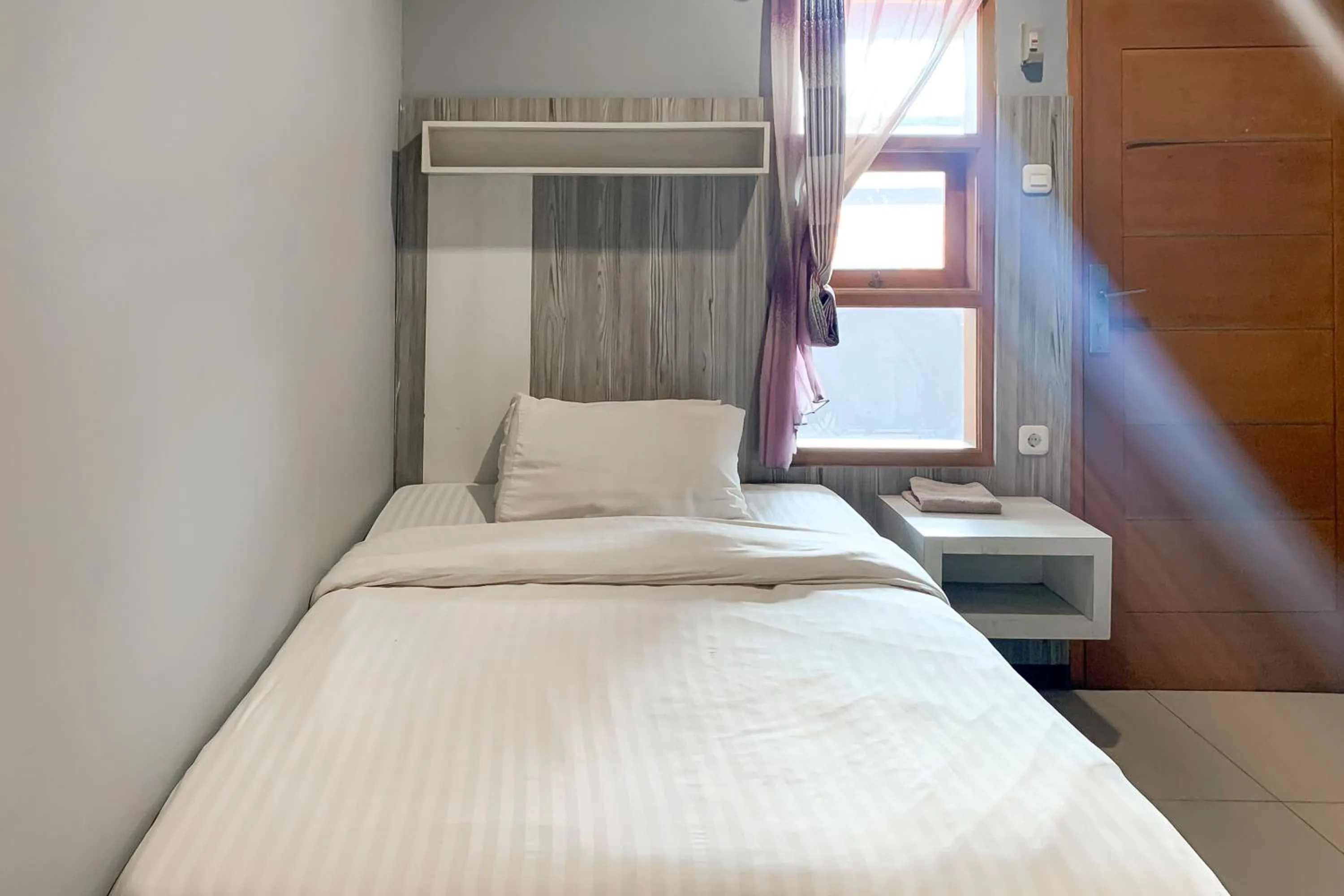 Bedroom, Bed in Karins Guesthouse Syariah RedPartner