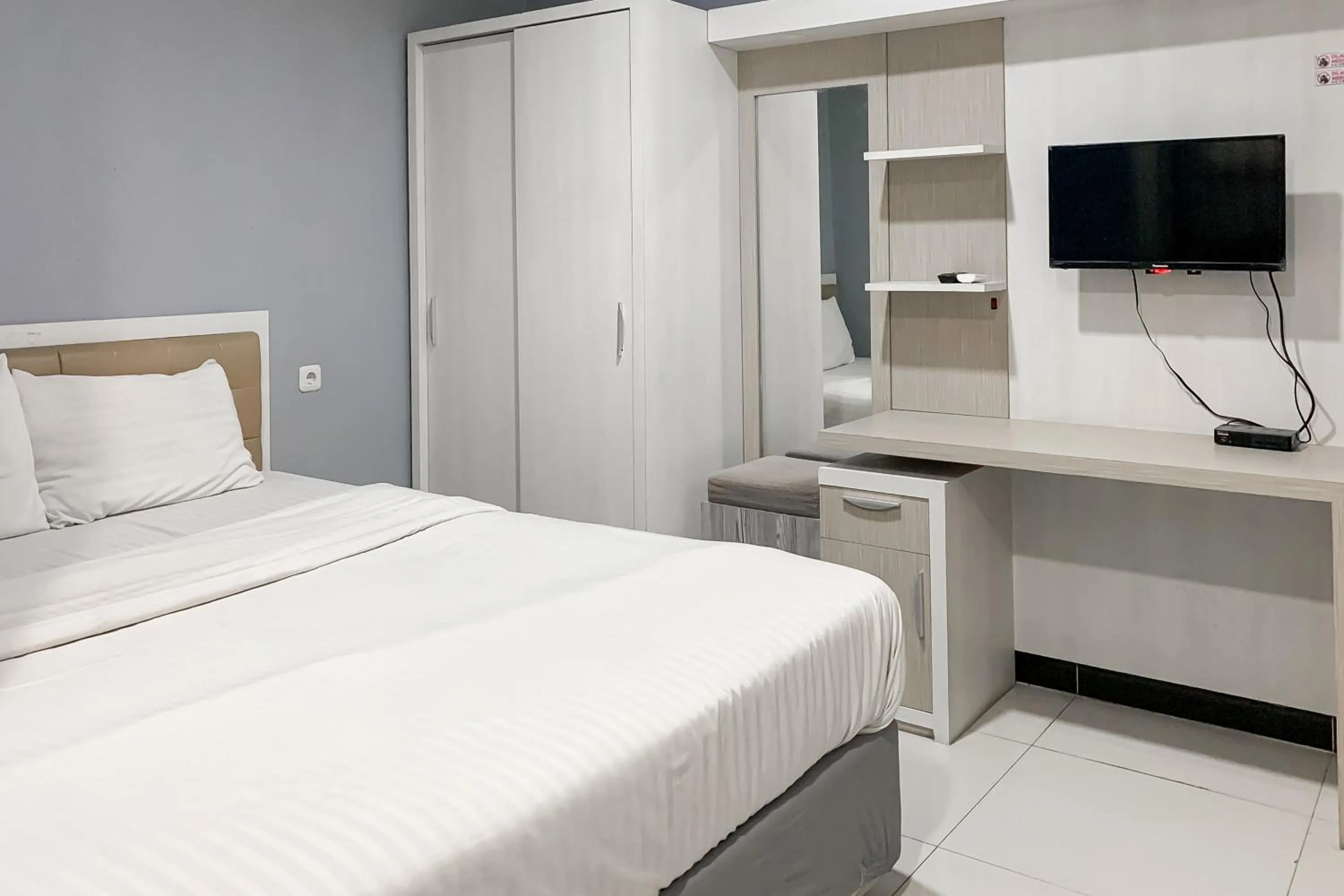 Bedroom, Bed in Karins Guesthouse Syariah RedPartner