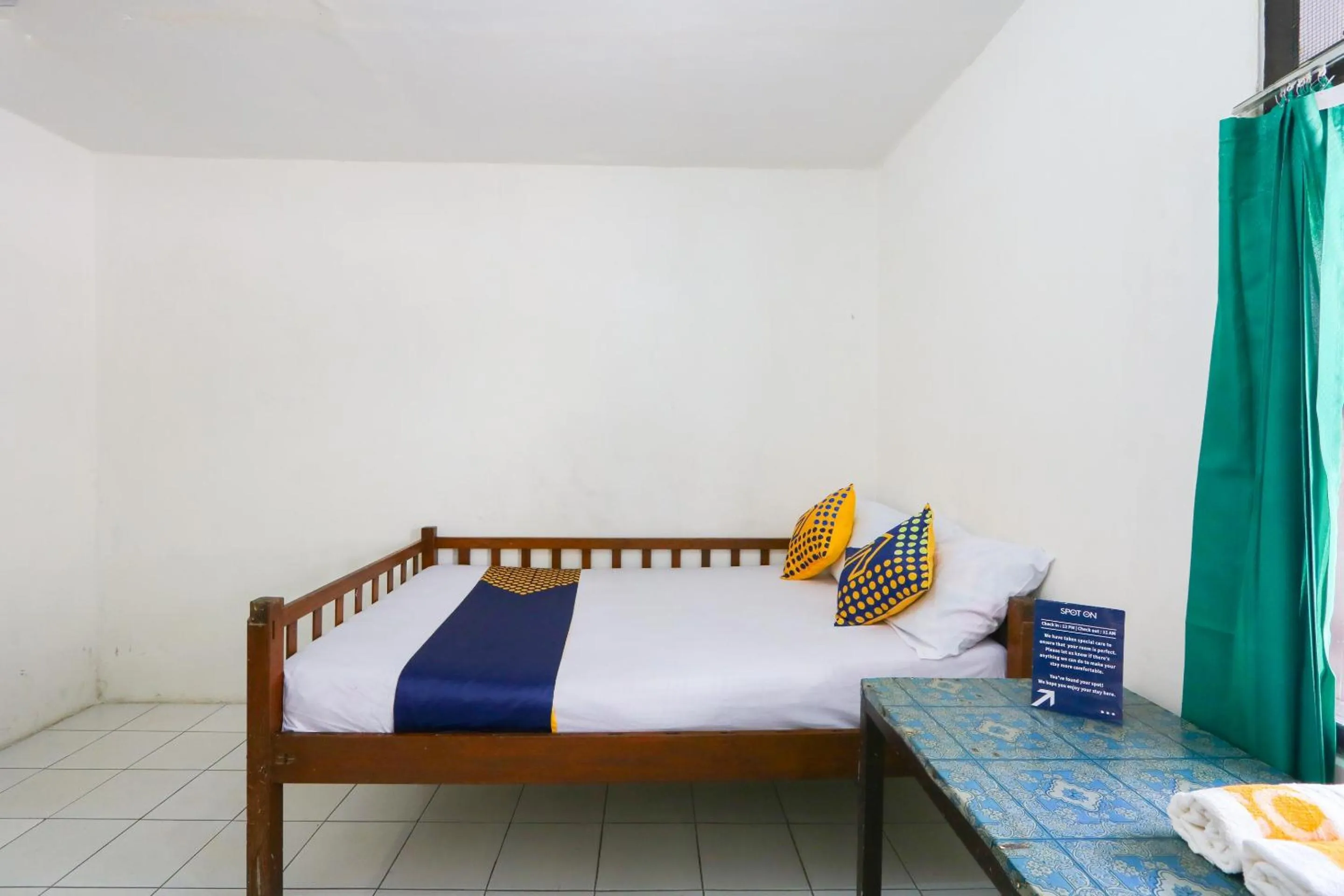 Bedroom in SPOT ON 2422 Hotel Moga Sari