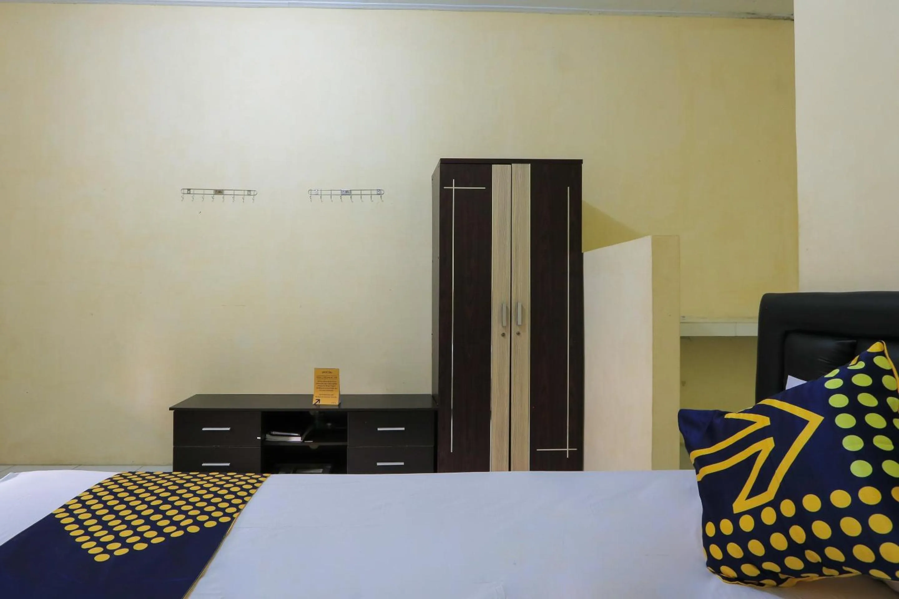 Bedroom, Bed in OYO 2371 Islami Family Residence