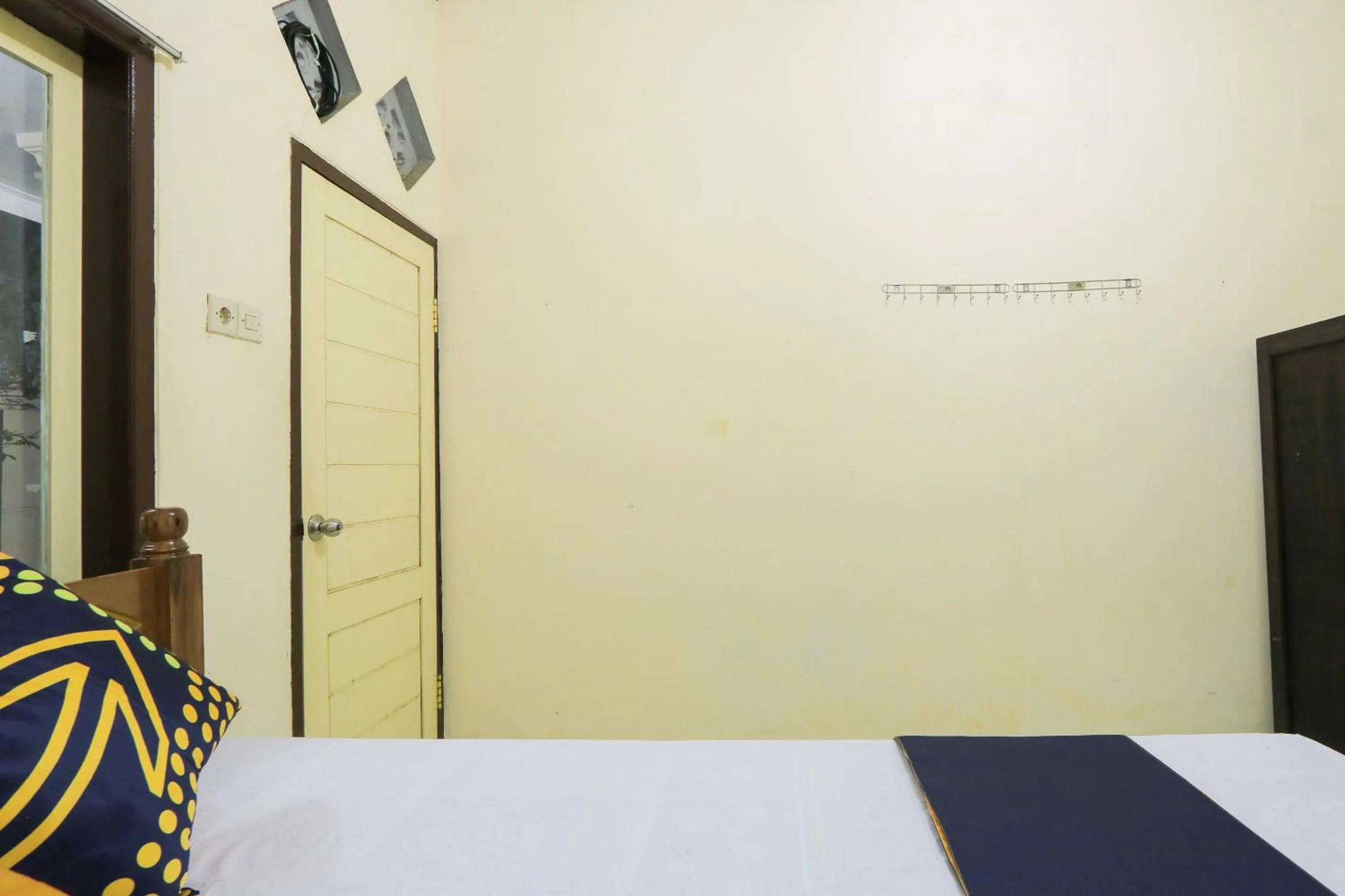 Bedroom, Bed in OYO 2371 Islami Family Residence